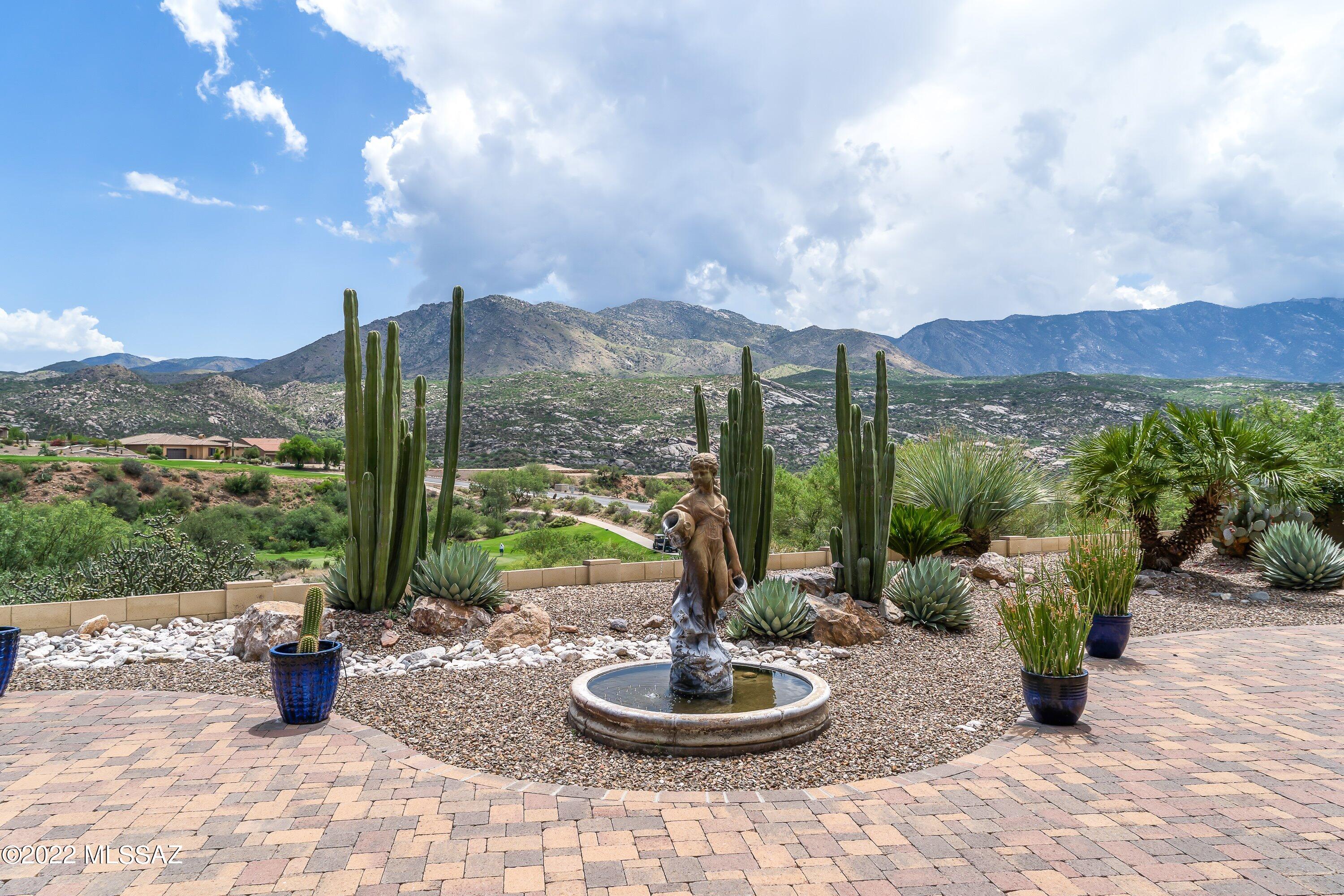 Spectacular views abound from this popular Sonoran model in SaddleBrooke's Preserve. Private courtyard leads into this special home w custom touches throughout. Whether entertaining or enjoying the views in front of the patio fireplace, this home has it all w light porcelain tile floors, exposed beams in great room & stunning views. Open & spacious great room, island kitchen & cozy morning room for enjoying your coffee while watching the sunlight play across the mountains. Through the butler's pantry the open dining room awaits. Large owner's retreat has sitting area, en-suite & large walk-in closet plus beautiful views. Your guests will enjoy privacy whether in the guest suite or Casita. Outside enjoy the expanded hardscape, patio fireplace & private putting green w views surrounding you