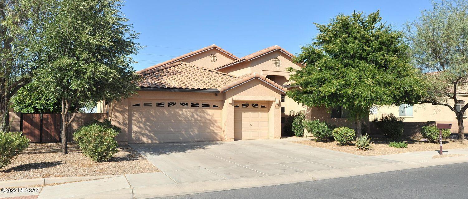 Open floor plan with space for all! This 2338 square foot home features tile or wood laminate flooring in all living/traffic areas. Bright and cheery kitchen with plenty of cabinets stainless appliances and slab granite countertops.  Both bathrooms also feature the slab granite countertops, the Owners Suite also has a separate bath and shower. Outside features two separate grass areas, sparkling pool, and covered patio. Great place to entertain or just relax! Pool Service included, tenant responsible for landscape maintenance. Up to two well behaved pets accepted with fee.