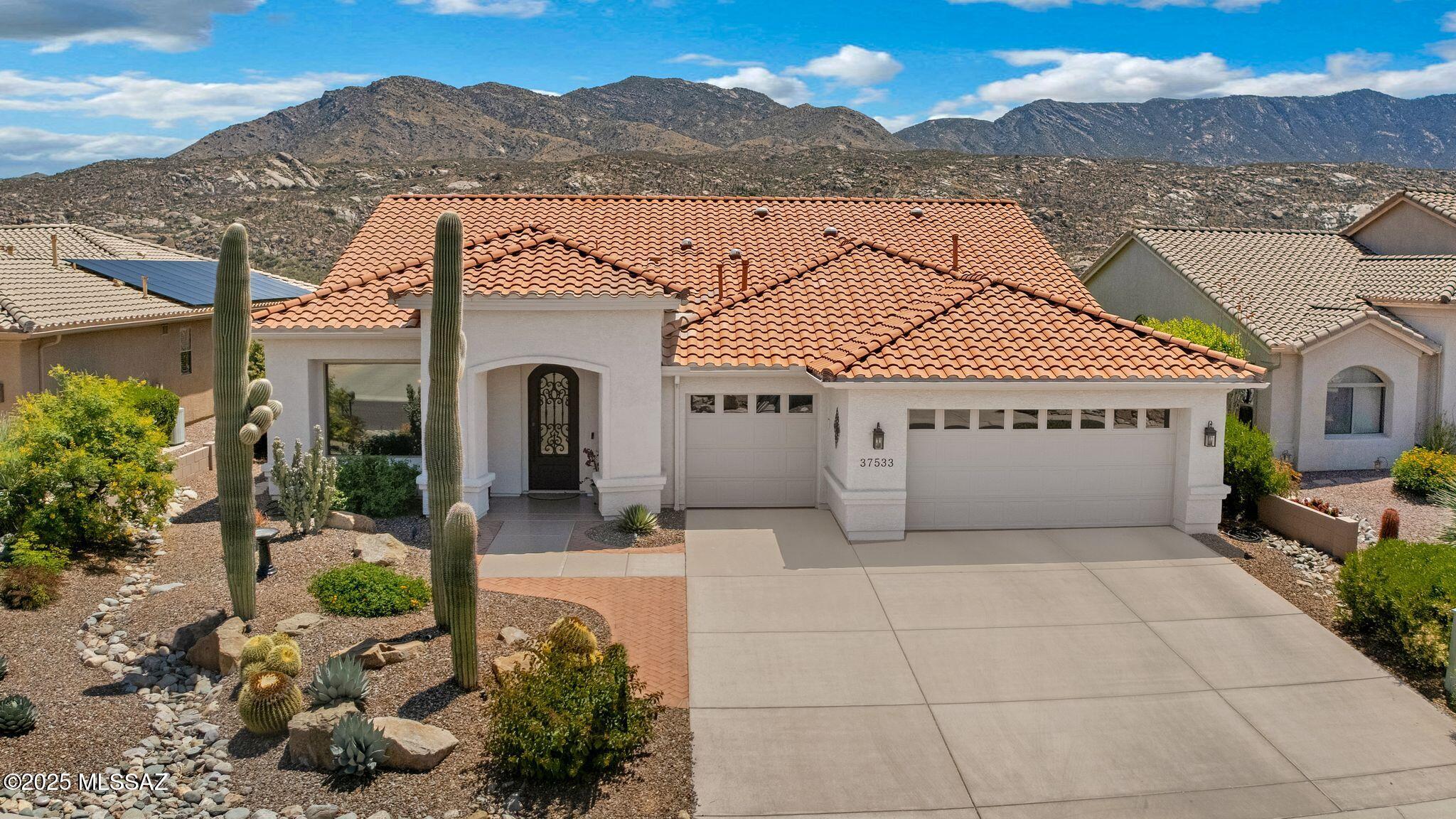Updated Cheyenne in SaddleBrooke, where Panoramic Mountain Views await you. Great Curb Appeal! Custom Entry Door. As you enter, find Den with Glass French Doors & Private Dining Room. Wet Bar to entertain. Great Room near Kitchen with SS Appliances, Gas Cooktop, Granite Counters, Island, Cabinets with slide-outs, Kitchen Nook & Slider to Patio. Powder Room. Owner's Suite has Bathroom has Granite Counters, Walk-in Shower, & 2 Walk-in Closets. #1 Guest Bedroom has Closet. Guest Bathroom has Shower. #2 Guest Bedroom is currently being used as office & views from 2 large windows. Built-in Cabinets in Closet can easily be converted back to closet. 7 Solar Tubes. Laundry Room with W/D, Sink & Cabinets. Extended 3 Car Garage has Cabinets. Lovely Landscaping, Gated Yard & Mountain Views to enjoy!