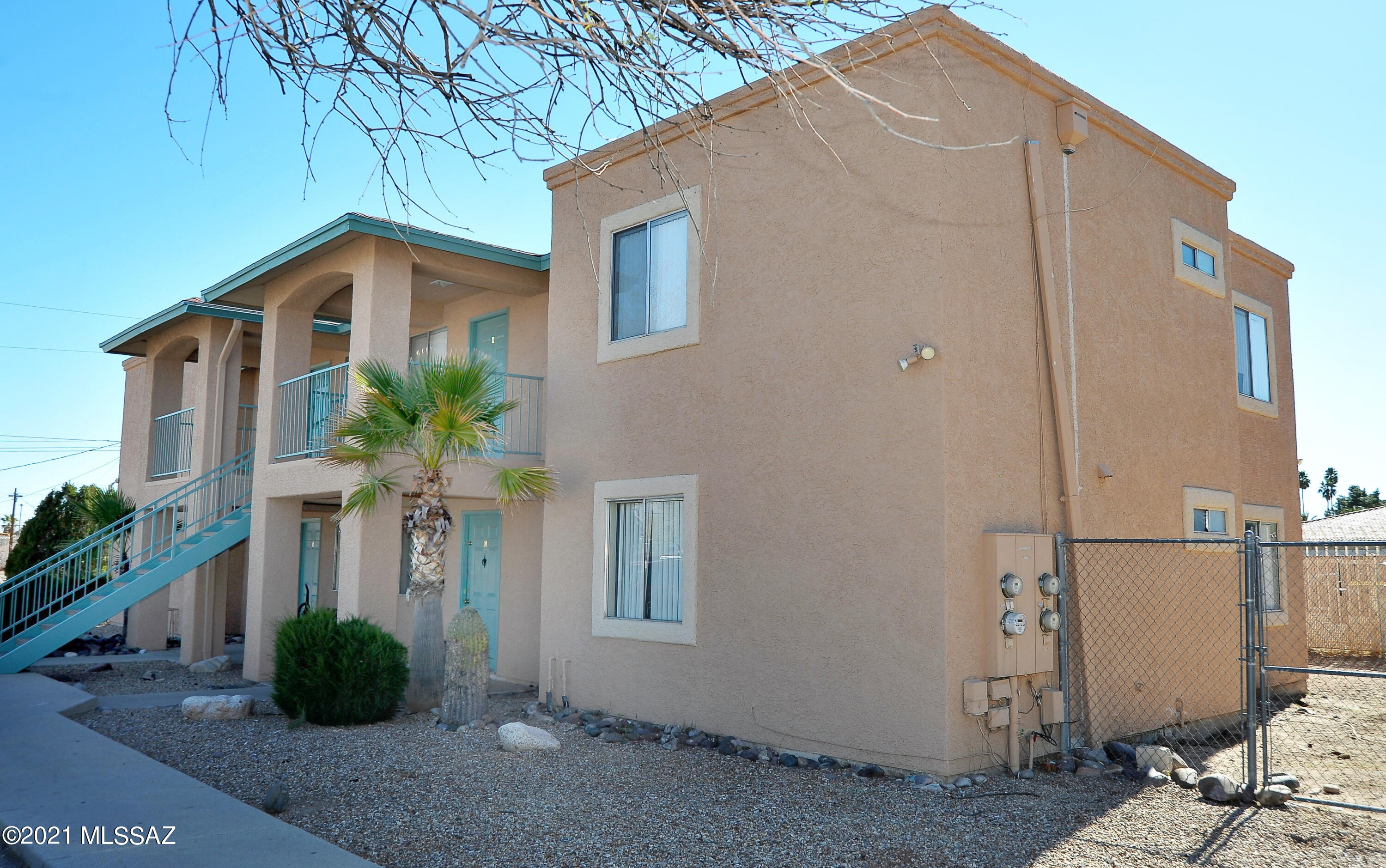 This is a great opportunity to own 4 units close to everything. Located near the School for the Deaf and Blind, Only minutes to the UofA, pima community college, Mercado, Barrio, and downtown. Near El Rio golf course. Plenty of parking.  All units are in great shape with tile floors, AC, Balconies or enclosed yards, laundry in each unit. Call Danny for information on purchasing  3 four plexes on same property for a total of 12.  They have 3 different tax codes for easy financing.  They share parking lot and dumpster at this time.