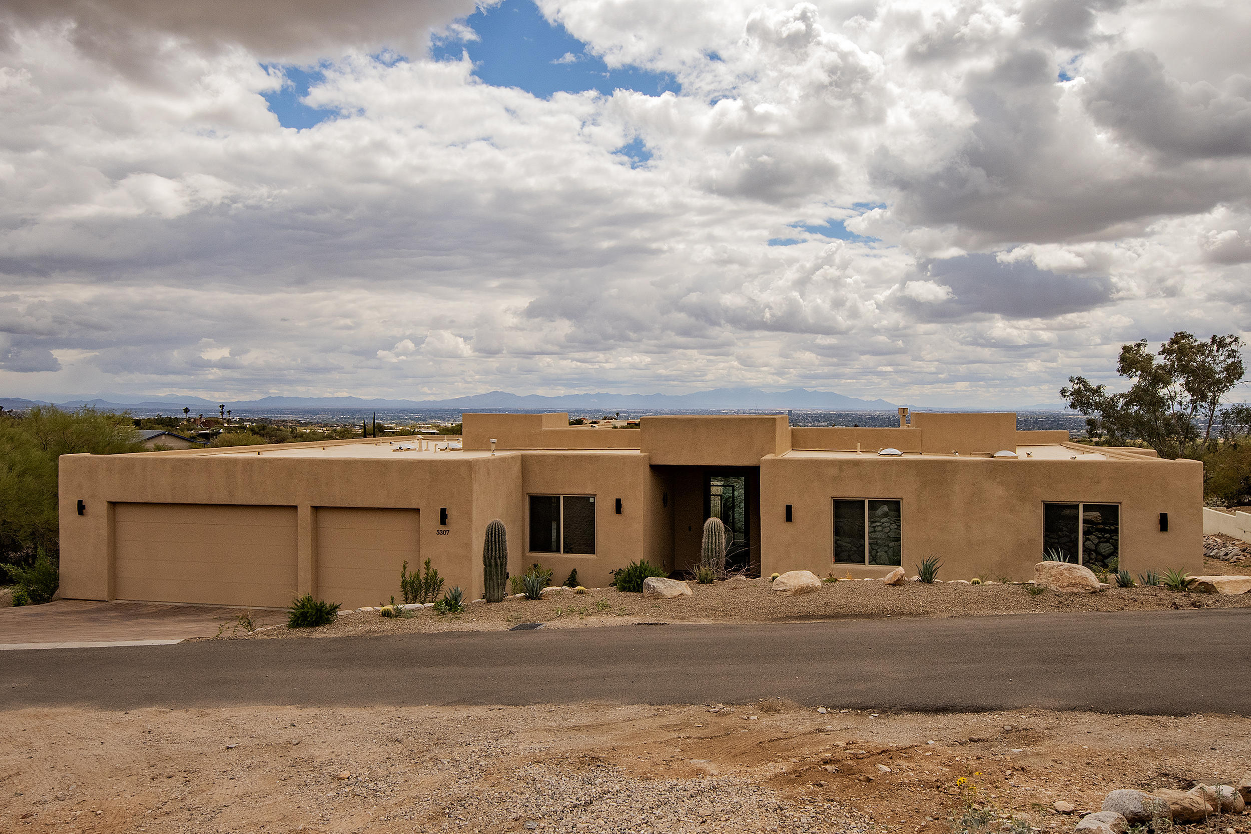 Range price listing, seller will accept or counter offers within the range of $1,000,000-$1,200,000. The work transfer is good for you, move into this brand new modern home with great city views, pool, great outdoor area for entertaining. They spared no expense building the 5 bedroom 5 bath home. Nice great room with fire place, ungraded kitchen, sub zero fridge, large gas cooktop, breakfast bar/kitchen island are just a few of the upgrades. Master suite has great views over the city, large master bath and walk in closets round off the private suite. Three car garage, plenty of room for the toys. The parking spot in front of home is also owned by seller. Everything is brand new, come  enjoy the view and stay for a dip in the pool in your brand new home. Thanks