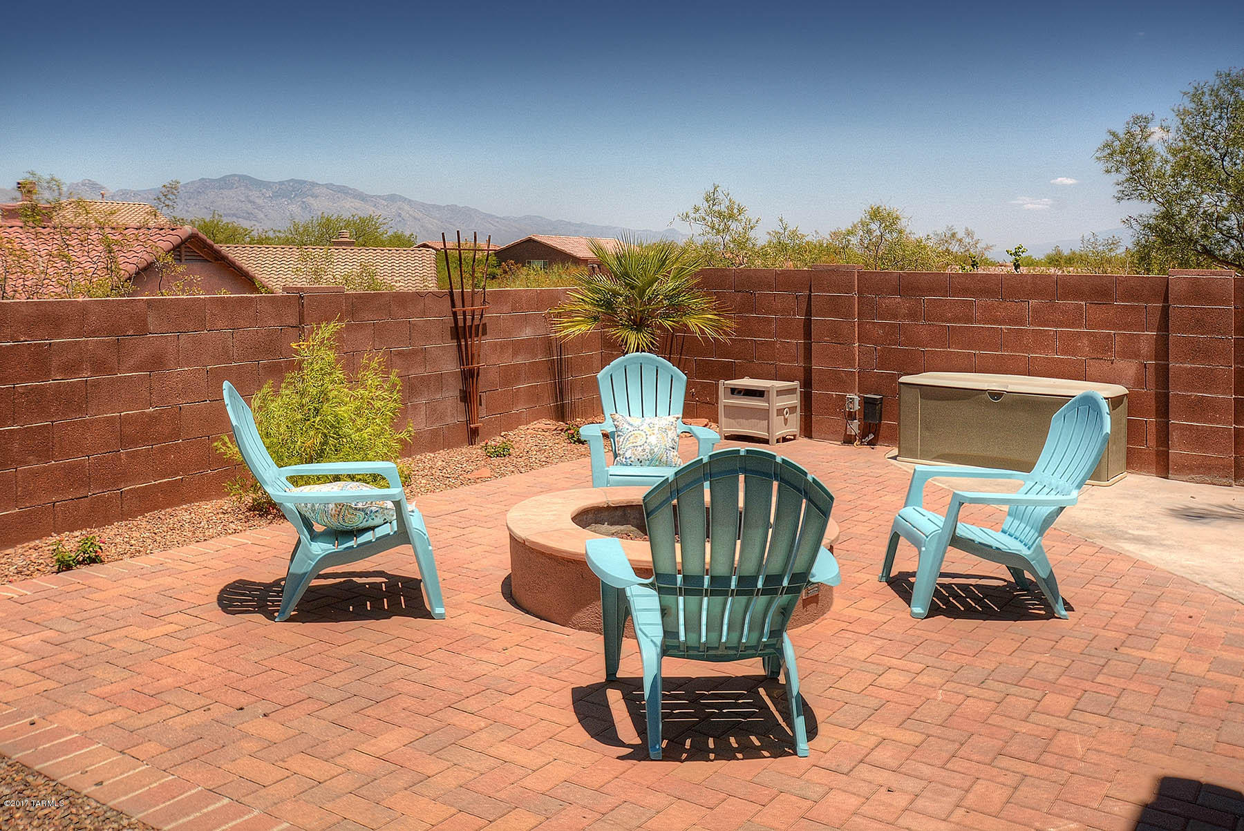 WOW! THIS HOUSE IS ADORABLE!  Great west side
gated subdivision, Cul de Sac lot  with lovely Catalina
Mountain Views!  Freshly painted inside and out!
Beautiful tile floors in the great room, kitchen & family room. New carpet in two bedrooms & wood laminate
in master and 4th bedroom.  Great Room has French
doors to the patio. Kitchen opens to family room, nook
area, granite tile counters, center island and NEW gas range!  Lovely master suite has double door entry, walk in closet, double vanities, new shower doors.  2+2 split plan.  FABULOUS yard with brick pavers, pretty landscaping, gas fire pit and separate
dog run.  ENJOY THE MOUNTAIN VIEWS! PRIVATE LOT! PRISTINE CONDITION INSIDE AND OUT - MOVE  IN READY!