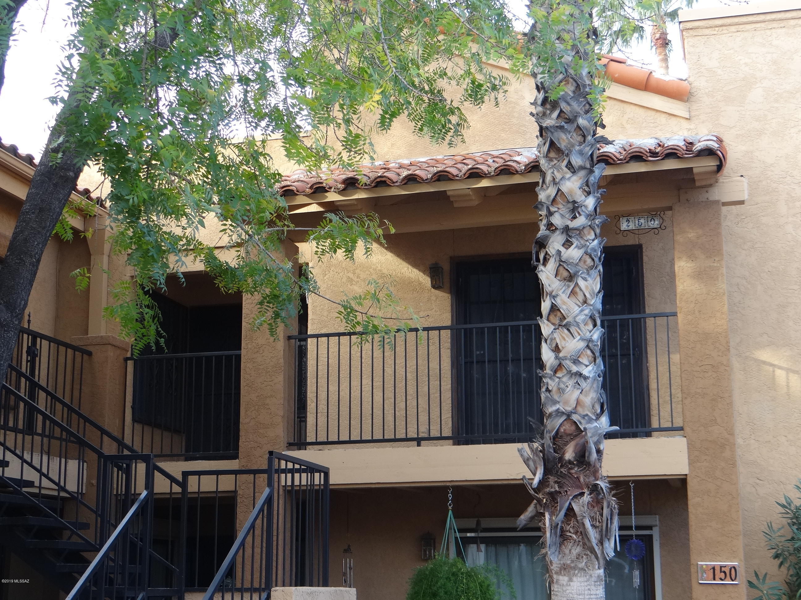 This well maintained 2nd floor offers spectacular views and privacy and is convenient to shopping and restaurants as well as easy access to downtown and the U of A.  Floor plan is perfect for a room mate situation as each bedroom has its own bathroom.  Master offers an over sized walk in closet.  Living offers a beehive fireplace and french doors to patio with mountain views.  Covered parking with storage is close to unit, washer & dryer located inside unit,  and community offers a club house plus pool & Spa. Property available Sept 1st.