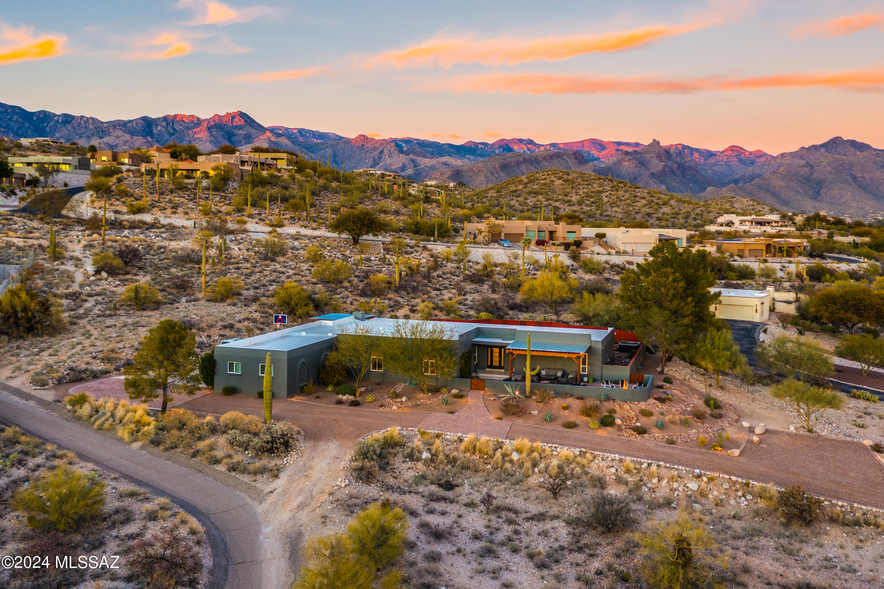 Exceptional 1.53-acre hilltop lot with breathtaking, unobstructed panoramic views of both the city and mountains. This sprawling residence features a well-designed 6-bedroom split floor plan and 4 full bathrooms. Custom upgrades throughout, including cabinetry, flooring, kitchen, bathrooms and outdoor spaces. Designed for entertaining, the home boasts a seamless flow. The front patio serves as a captivating vantage point for watching the sunrise and sunset. The spacious 3 car garage has an additional storage room and high ceilings. Seller is a license realtor in Arizona.