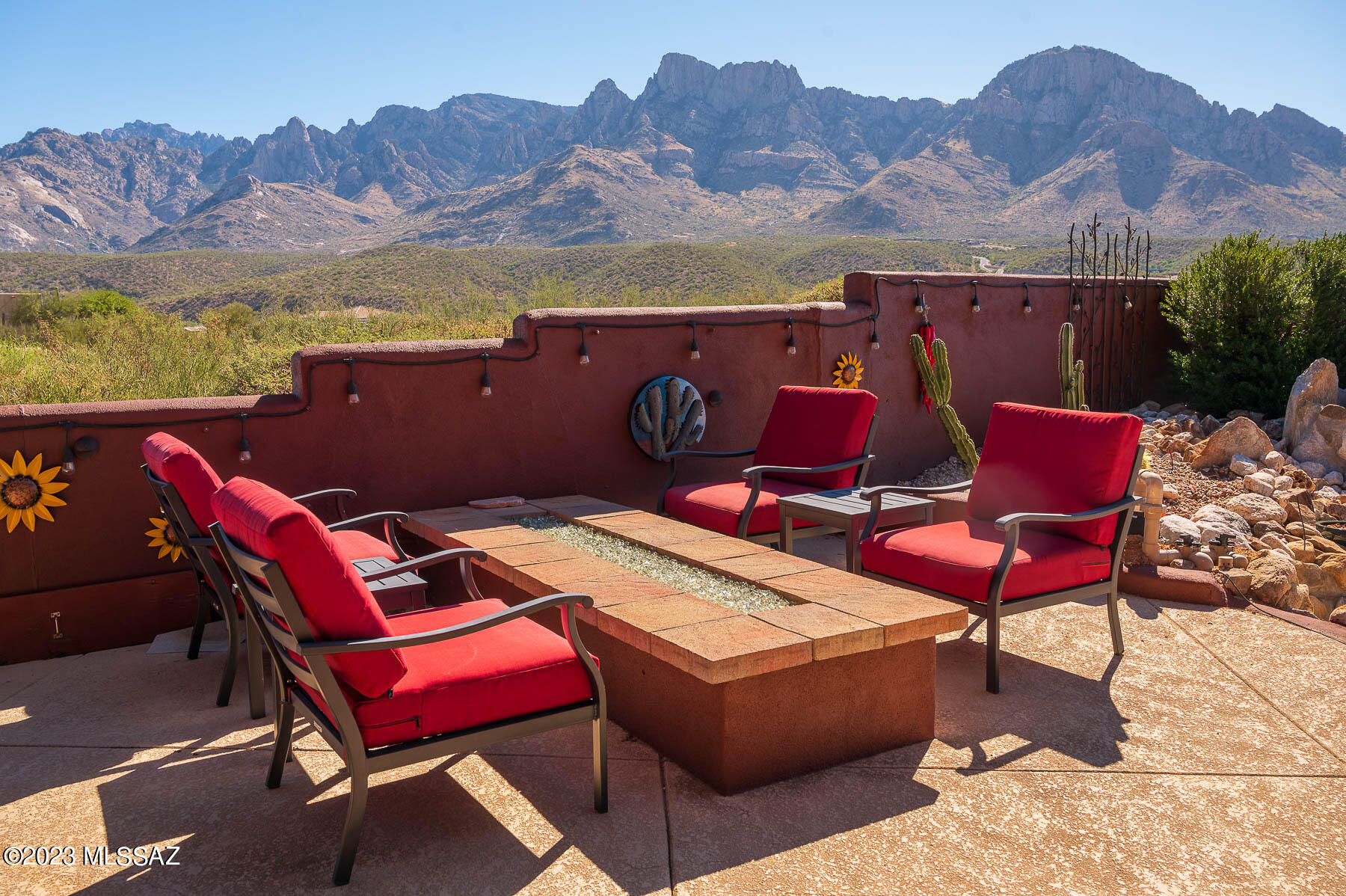 Serene beauty with unobstructed, breathtaking views of the Santa Catalina Mountains and Pusch Ridge! Welcome to one of Oro Valley's sought after communities. Nestled on over 1 acre, plenty of privacy and surrounded by lush desert. The home boasts over 3000sqft of living space, bringing a blend of casual living and elegance. Large gourmet kitchen features Viking Range, double Wolf Ovens , Quartz countertops and lots of cabinets.  Step outside and enjoy the lush resort like backyard with a sparkling spool, built in BBQ, large fire pit and professionally installed misters. Needing storage? The oversized 3 car garage offers plenty of storage, workbench, great for large vehicles and hobbies! House comes with a home warranty. No HOA! Don't miss this opportunity!
