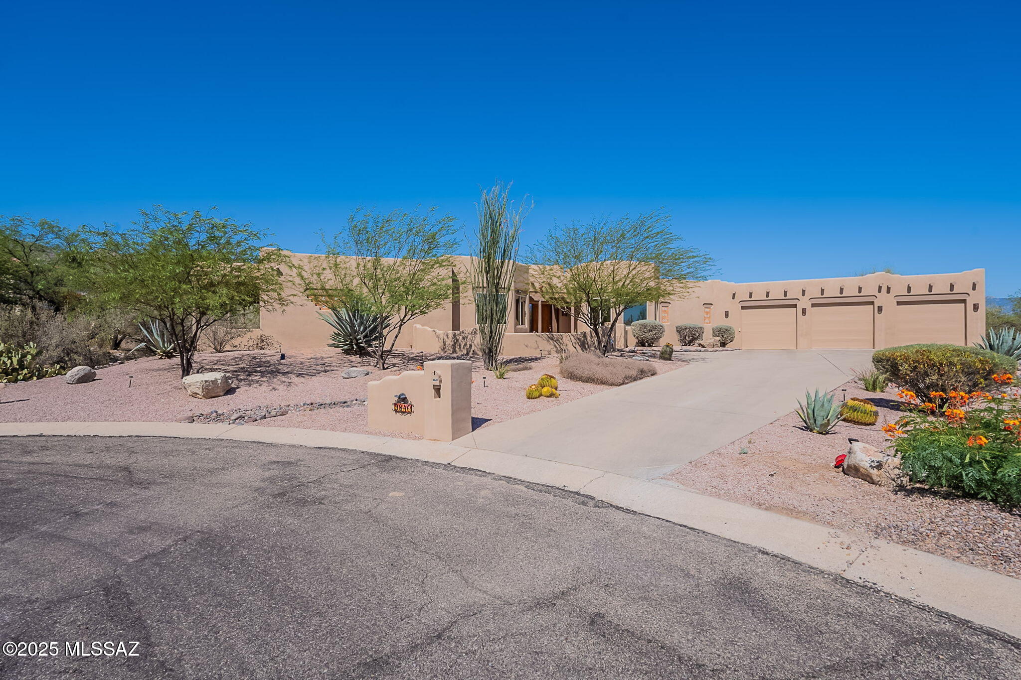 Beautiful 3,423 sq ft Santa Fe-style retreat nestled in the foothills of NE Tucson's premier desert landscape, just blocks from golf and hiking. This stunning home offers 3 bedrooms plus a versatile den (or 4th bedroom), walk-in closets, and 5 luxurious baths. Inside, an expansive open-concept design blends southwestern charm with modern upgrades. The fully renovated primary bath is spa-inspired, while the kitchen features granite countertops, repainted cabinets, and stylish finishes. Enjoy peace of mind with a brand new water heater. Entertain on the wraparound patio or relax by the pool while taking in breathtaking mountain views. A true NE Tucson dream retreat!