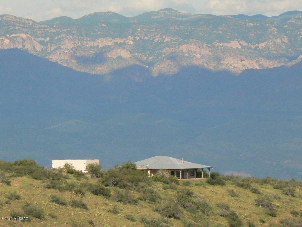 Pristine Riparian Paradise w/360 degree VIEWS and against National Forrest.  Peppersauce Creek bed wanders through the entire 200 acres (5/40ac parcels, each are surveyed & have their own tax parcel #).  Wildlife list is endless. Home is on additional 10 acres which is included. As private as this is, you are just about 8 miles out of the town of Oracle and Oro Valley is about 35 minutes away.  Mt Lemmon Rd has just been paved an additional 2 miles, which is just about 1.5 miles before this magnificent property. Check out 3CRanch, AZ Zipline and HCR Horse Ranch & RV Park on line(area neighbors).
