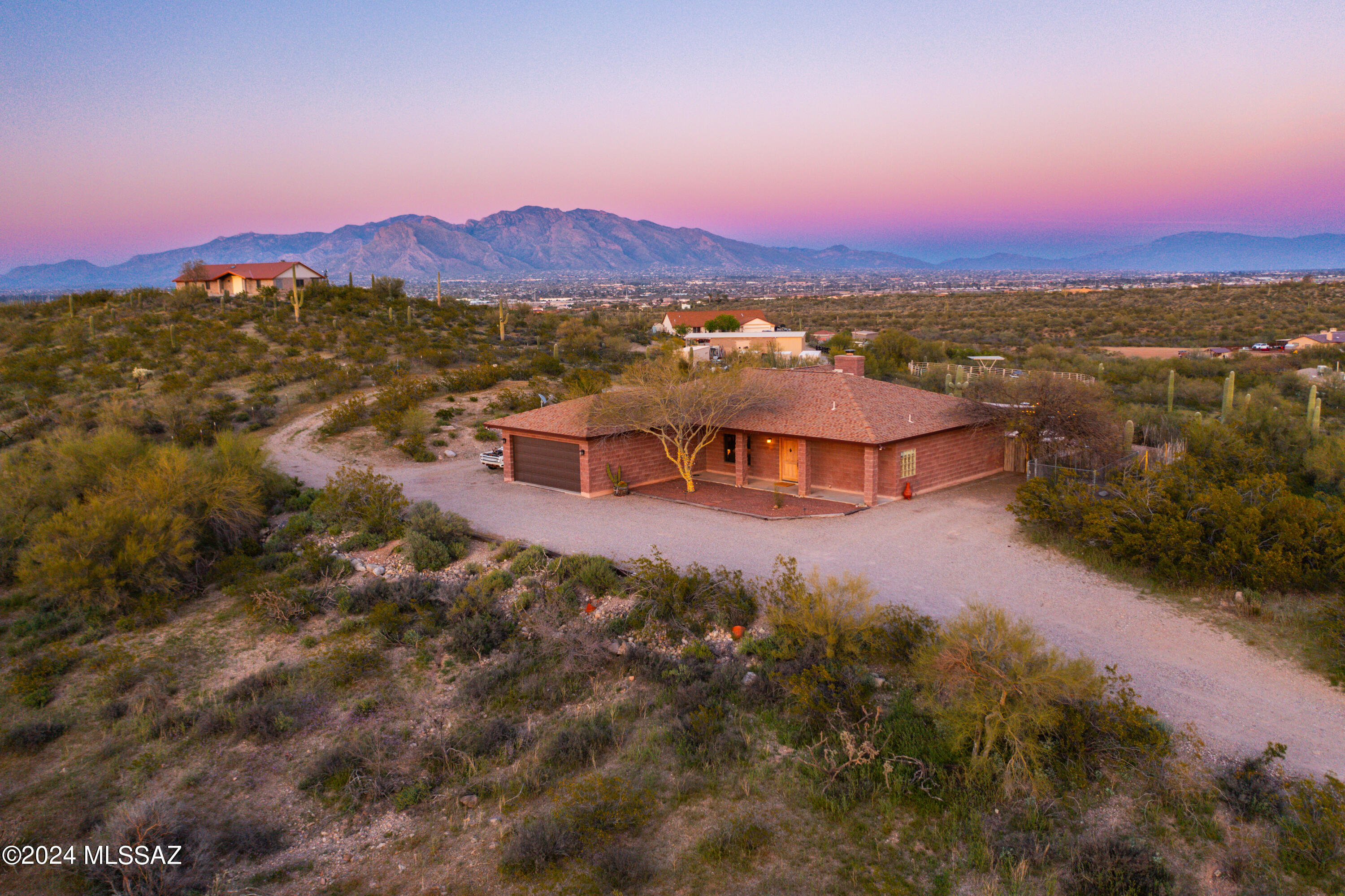 This spacious 4 Bedroom, 3 Bathroom home on the West side of Tucson boasts luxurious amenities including a sparkling pool & relaxing spa, perfect for outdoor entertaining & leisure. Additionally, it features a versatile studio space, ideal for a home office, gym, or guest quarters. With ample living space and modern conveniences, this property offers the perfect blend of comfort and functionality in a desirable location. Nestled on 4.5 acres, this home offers breathtaking views of the mountains & city as well as sunrise & sunset views! Enjoy the serenity of the surrounding natural beauty of the desert! Don't miss out on this beautiful home! Call today for your private showing!