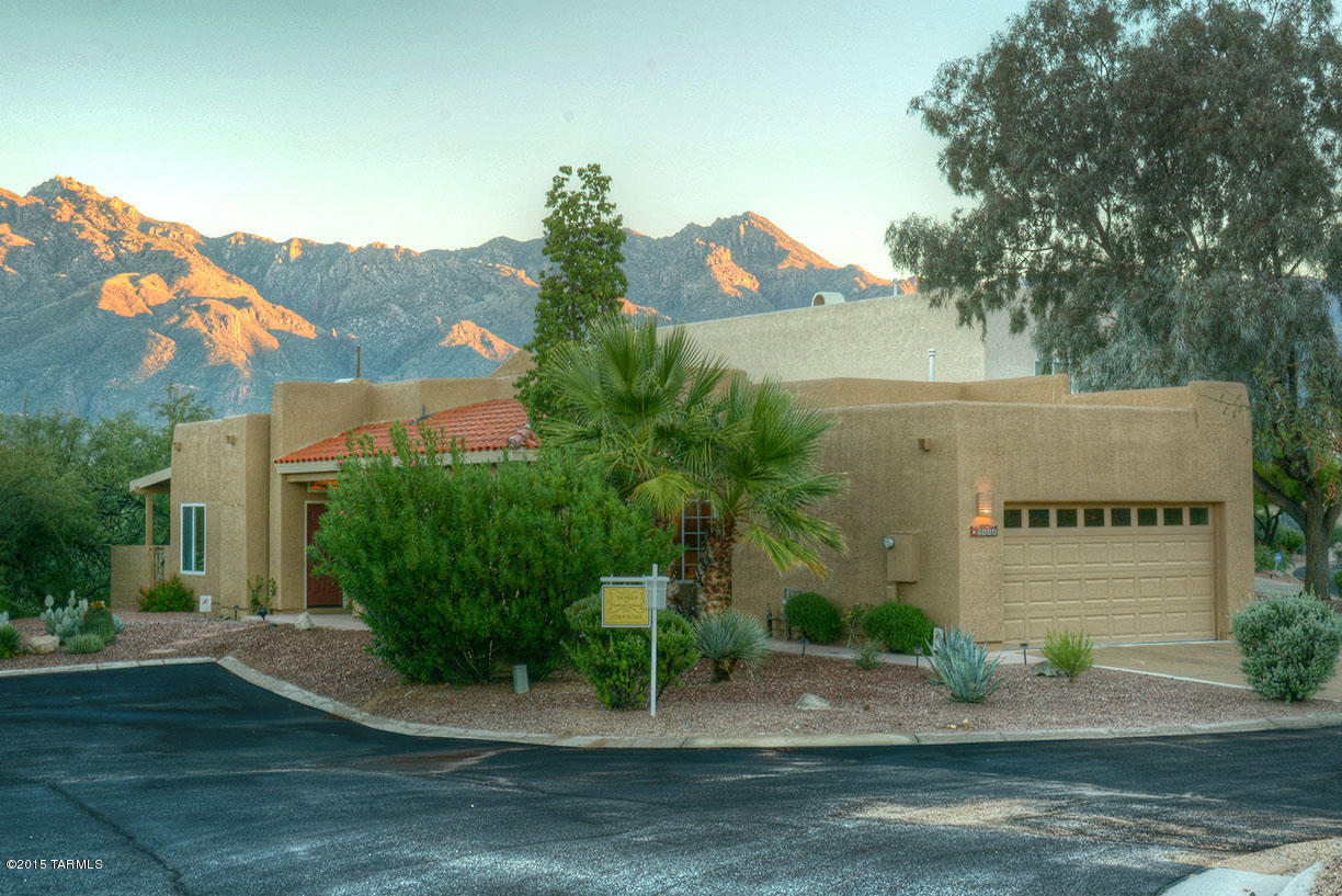 Gorgeous location with mountain views. No neighbors behind nor to the west. Enjoy privacy and all the nature and vegetation. This beautifully updated 2 bdrm plus den, 2-bath townhome is ready to move into. All appliances stay. Upgraded features include: Concrete overlay and stained floors throughout, interior walls, ceilings repainted (Dunn Edwards paint),Exterior freshly repainted, Granite counter tops in kitchen, Termite treated 2/2015 with five-year  warranty, kitchen/bathroom cabinets refinished (painted/sealed), New kitchen cabinets added,Roof resealed,Home owner warranty good through 9-21-16 transferable,New convection microwave, Fireplace cleaned 11/2014,New bathroom lighting fixtures,New faucet Fixtures,New kitchen disposal,Epoxy garage floor, 5-yr termite warranty included.