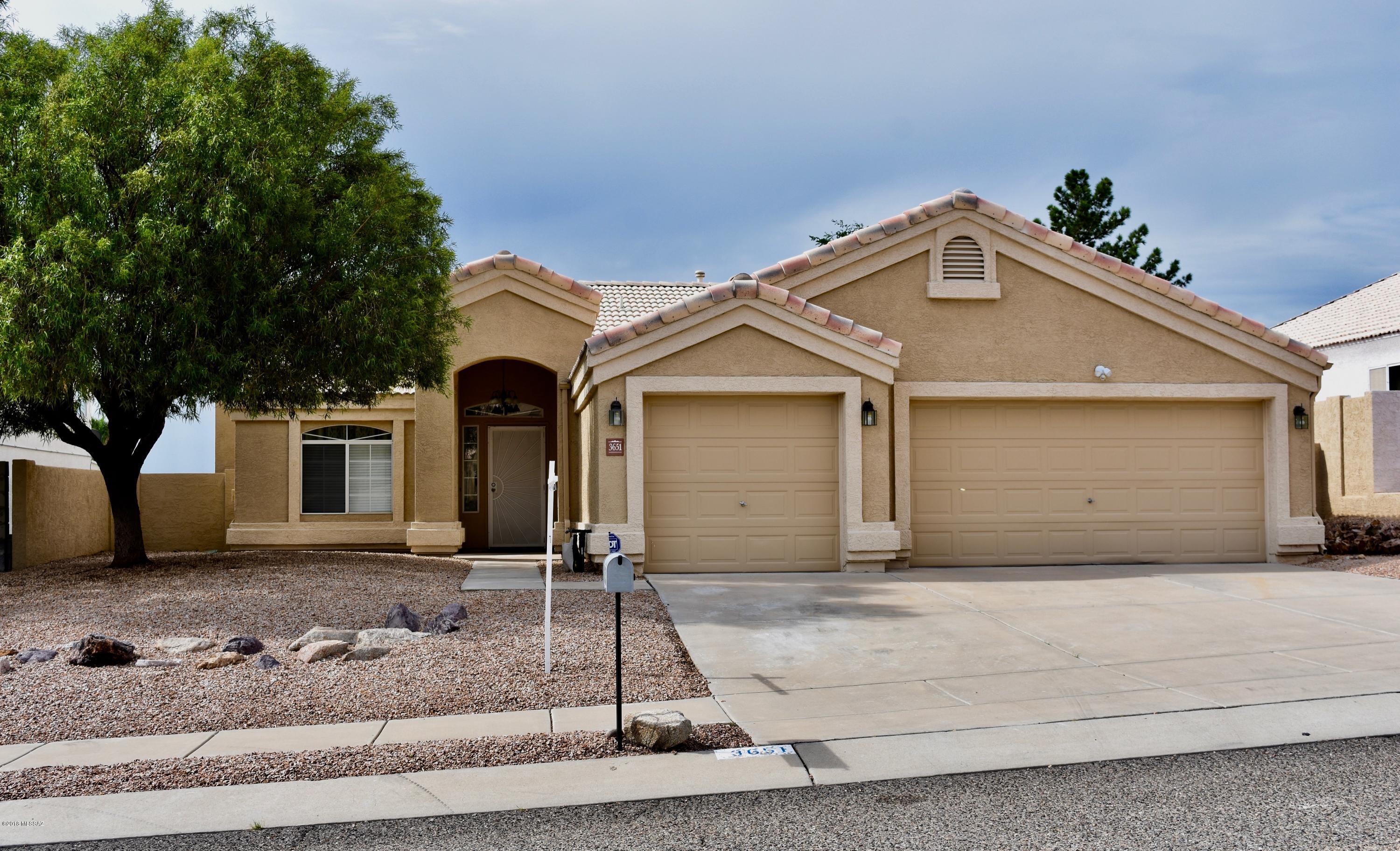 Here it is! The home you have been looking for.4 bedroom,2 bath,single-story with a 3 car garage. Quiet cul-de-sac with NO HOA! In 2015: new paint inside and out, new appliances, new carpet, new vanity in hall-bath, new  sleek light-fixtures, new faucets, new toilets, shower-heads, HVAC, installed alarm, termite inspection with transferable warranty. In 2018 new garage door motors, motion faucet in kitchen sink, most windows have new screens.  Walking distance from award winning Butterfield Elementary School.  Near shopping, restaurants, Foothills Mall, movie theaters, Top Golf, Omni Tucson National, minutes from I10. This property is turn-key.  Easy care landscape. Long covered porch in back for Arizona lifestyle. Ready for you to move right in! You must come see this amazing home.