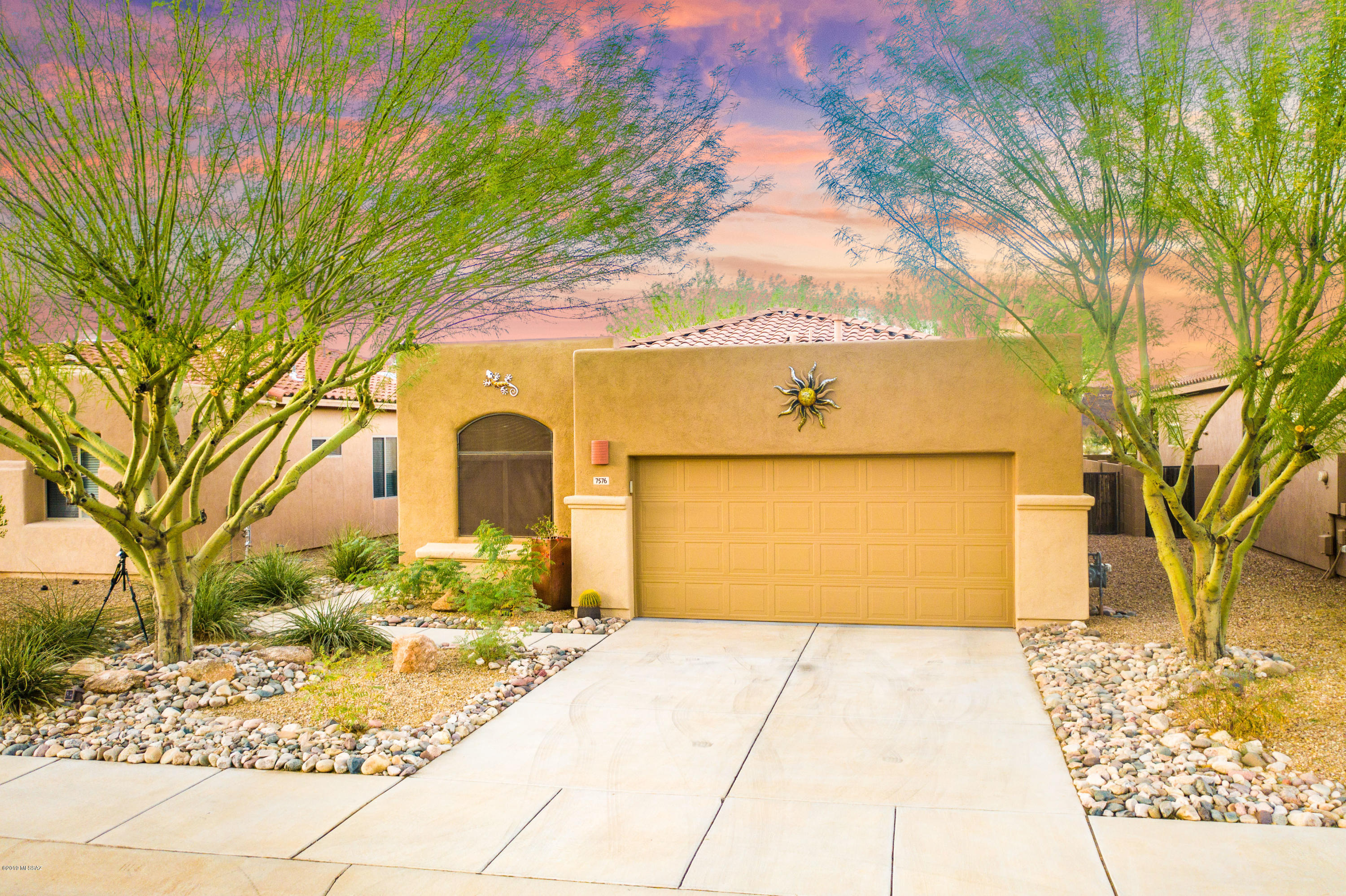 Nestled close to Sombrero Peak in gated Sierra Crest @Continental Reserve, THE updated home w/Mountain Views & PRIVATE backyard you need awaits! Lush landscaping w/intricate rockscaping welcomes you. Cozy front courtyard w/custom metal door exudes warmth. Fall in love w/Great Room ambiance- Gorgeous gas FP, flex space for sitting/dining, warm colors,niches PLUS clear Mountain Views! Functional open kitchen w/bar & nook. Grand entry to Master suite. Wake up to a serene Mountain vista. Mbath &Walk-in closet. Split plan w/2 spacious BRms & Hall bath. NO carpet! Add. wash/dry hookups in 2 gar. +utility sink. Live mesmerized by your Backyard VIEWS! You+family will LOVE private gatherings-will be the envy of all! Fresh ext. paint, new water heater, termite & home warranty. Close to I-10 & shops