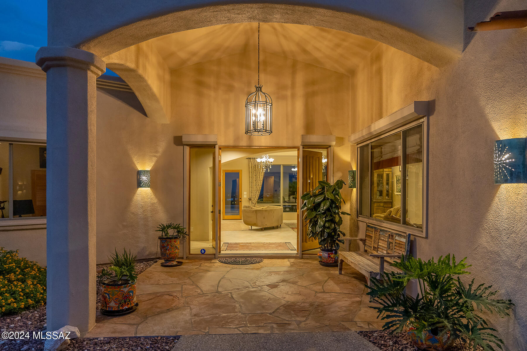 Perched on a prime 1-acre lot, this exquisite 4,702 sq. ft. home offers a sophisticated blend of luxury and comfort, perfectly capturing breathtaking panoramic vistas. The split-bedroom floor plan is highlighted by an expansive, open-concept design, featuring distinctive architectural details throughout.

Upon entry, you're greeted by a grand living room adorned with expansive windows, allowing natural light to flood the space. The 24''x24'' travertine flooring and an elegant formal dining room creates an atmosphere of refined elegance.

The gourmet kitchen, equipped with top-of-the-line Viking appliances, features a center island, granite countertops, a breakfast bar, and a modern corner butt glazed window that frames spectacular mountain and city views, seamlessly connecting to