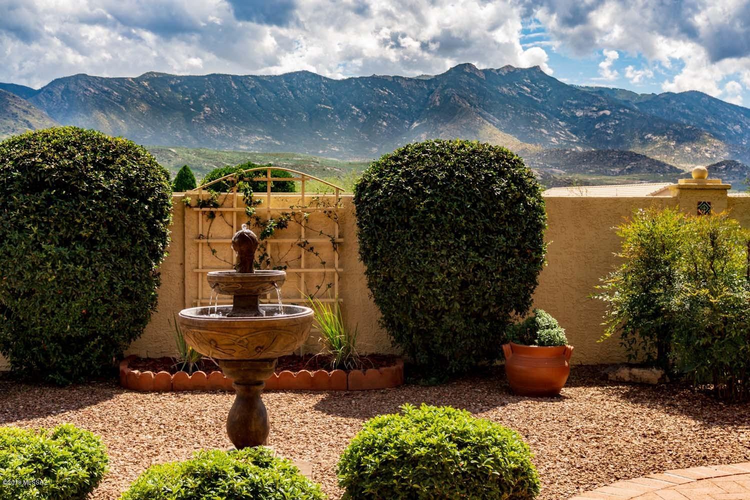 Absolutely Stunning, Unobstructed, Mountain Views from Living Rm, Family Rm, Kitchen & Master Bedroom, in this Updated, Remodeled Spanish Colonial, Estancia w/San Felipe Style, Saltillo Tile & Wood Beams a Must See in SaddleBrooke, Tucson's #1 Active Adult Comm. New Rustic 8 ft. Door Welcomes You to an Elegant Dining & Living Rm. w/Wood Framed, Sliding Glass Doors w/ Views. Dramatic Family Rm w/Mantled & Tiled Gas Fireplace is Open to the Classy Kitchen Boasting Chiseled Edge, Honed, Granite Counters, Garden Window Over Hammered Copper Sink, 5 Burner Gas Cooking, Prep Island & SS Appliances. The Spacious Master w/Upgraded Bath Enjoys Great Views.  Extended Guest Bdrm w/Murphy Bd, Walk in Closet, Guest Bath, Laundry Rm & Garage w/Golf Cart Parking Complete this Spectacularly Beautiful Home.
