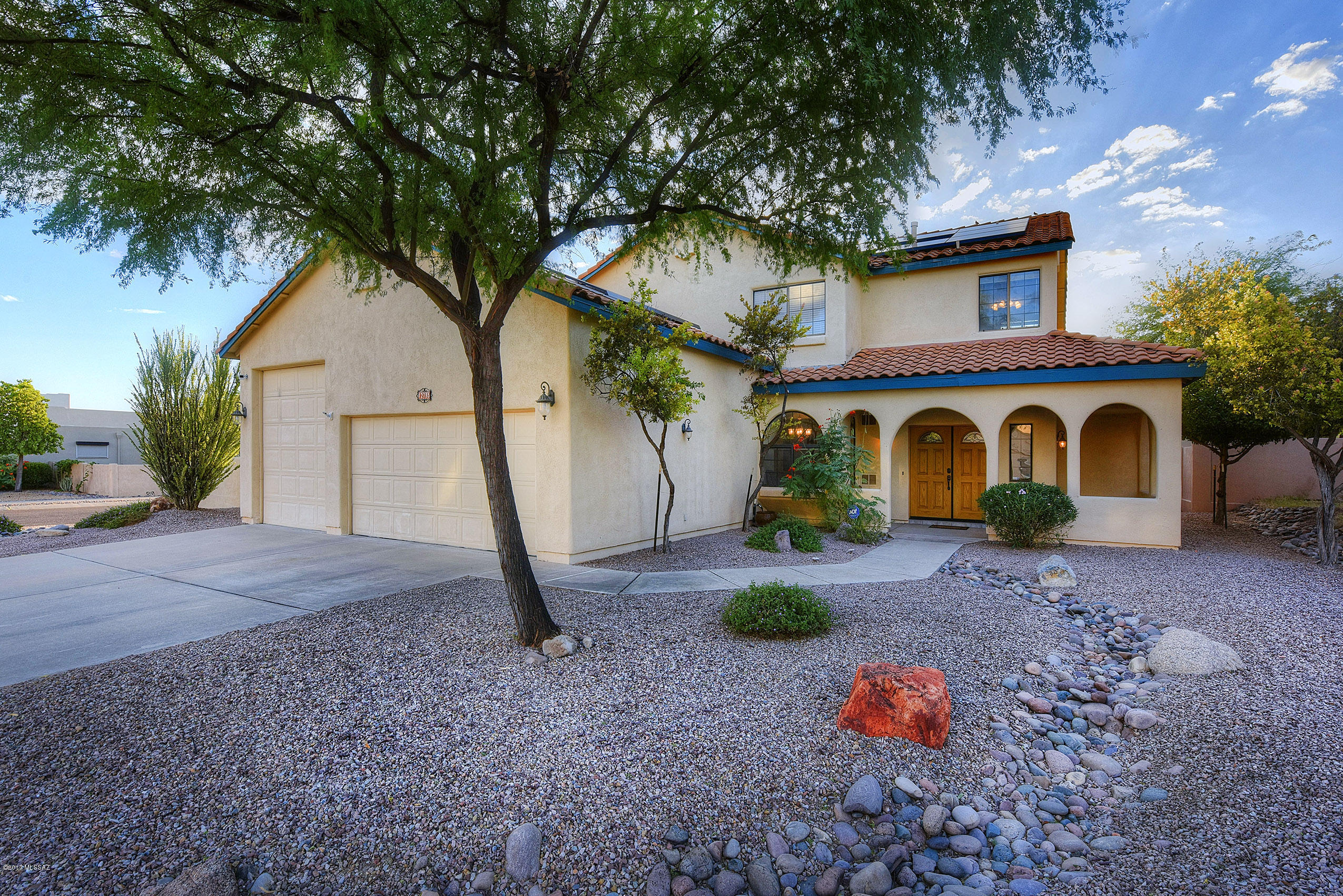 This beautiful 3 Bed/ 2 ½ Bath plus Den, is the perfect 2-story home.  It comes with gorgeous sunrise & mountain views, which can be enjoyed sitting at the pool or sipping morning coffee on the Master balcony.  Or curl in a window seat and read for hours! The kitchen boasts granite counters, a pantry with pull-outs & plenty of cabinets. Laundry room off  kitchen has been converted to a butler pantry filled with extra cabinets & storage. The laundry moved to the garage.  Duel cooling with new HVAC 3 yrs ago & also an evap cooling system.  The pool got a new pump 2 yrs ago & entire pool was resurfaced in May.  The 3 car garage is extended length & height with the 3rd door also extra height so an RV can be parked inside without paying storage fees!  House has solar for energy efficiency.