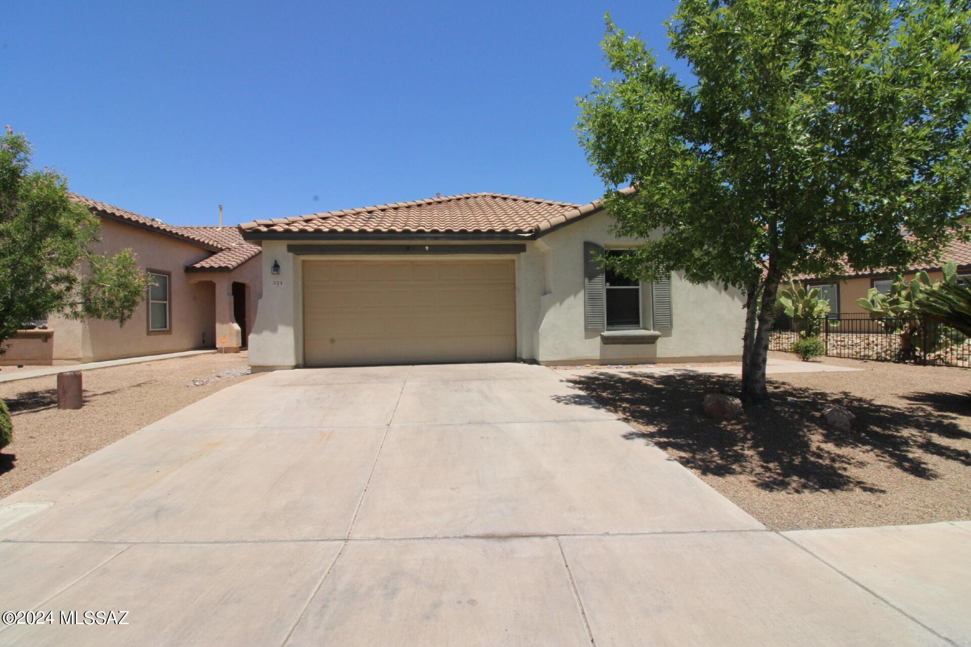 **MOVE IN READY! APPLICATION FEES CREDITED BACK AT MOVE-IN!**
1,861 SQ FT! 3 bedroom, 2 bath home in Sahuarita's Presidio Del Cielo community! Desirable single story floor plan. Charming kitchen with included appliances! Open concept living/dining. Neutral interior with tile flooring in all the right places! This home offers 3 nicely sized bedrooms. Primary suite with full bath! Blinds. Included washer/dryer! Enjoy a low up keep backyard with covered patio. 2 car garage!