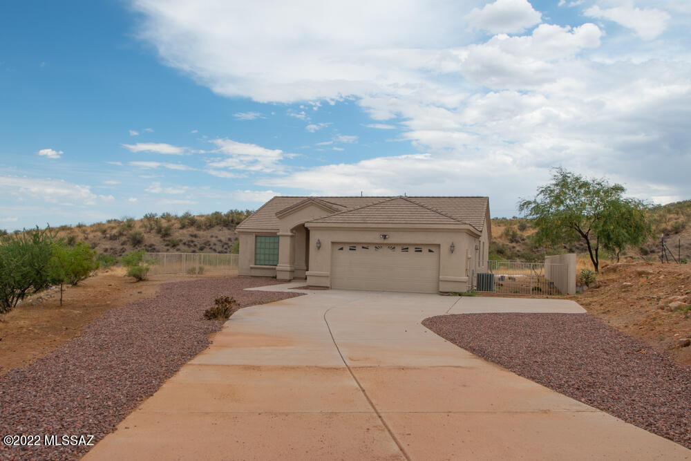 Seller to counter or accept offers from $309,900- $314,900. Spectacular 3 bedrooms 2 bath move in ready home with panoramic mountain views. Updated with new: interior/exterior paint, and garage door opener. The kitchen is equipped with an abundance of cabinets with crown molding, a breakfast bar and electric range. The bedrooms are generously sized with amazing closet space! Step outside and enjoy the mountain views from your backyard. Owner is a licensed agent