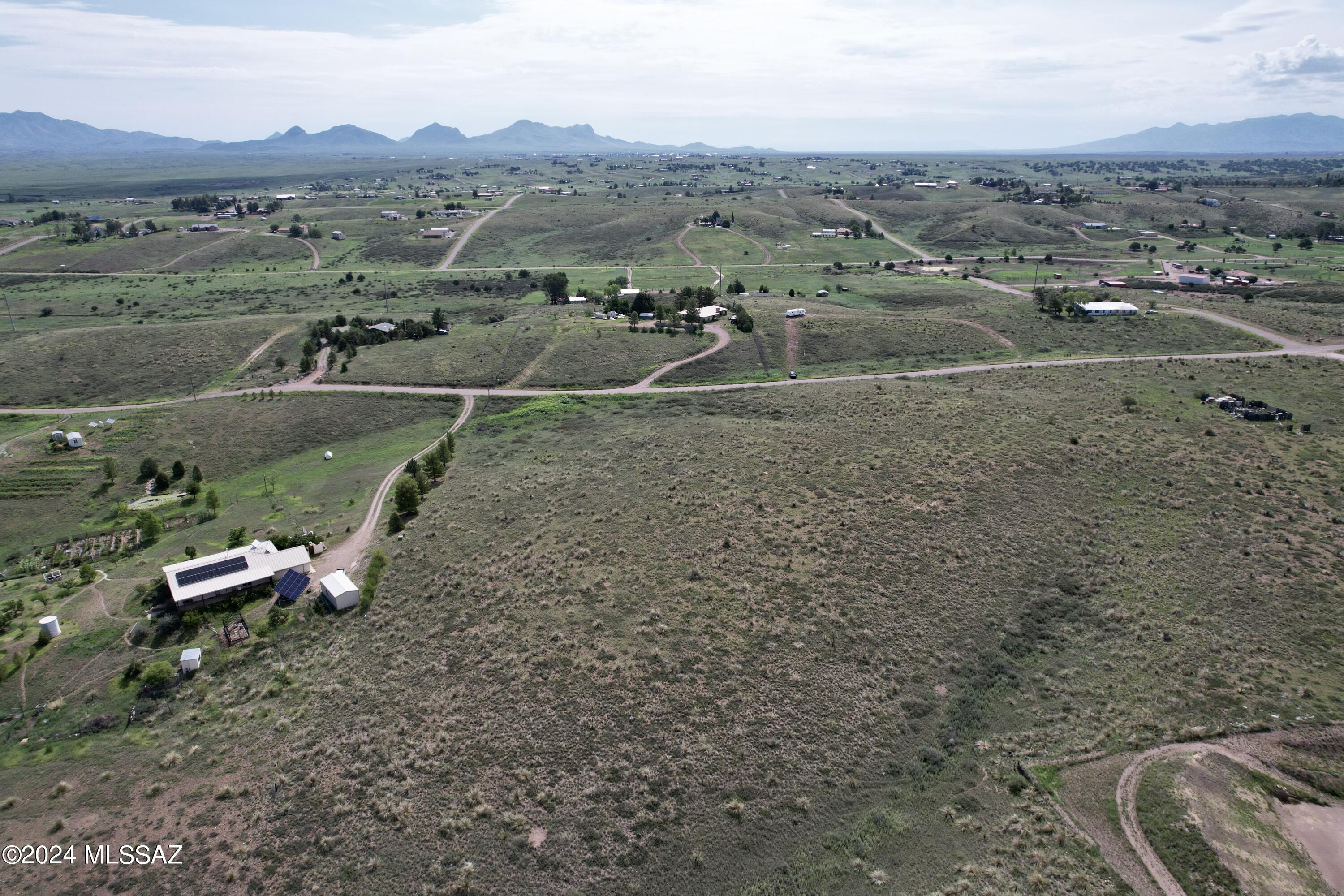 Located 1 hour southeast of Tucson, Arizona, this property sits in the highly coveted American Viticultural Area of Sonoita where local wineries and distilleries are thriving. The Sonoita AVA is the first federally recognized wine growing region in the state of Arizona. Within 45 minutes of Patagonia Lake/Parker Canyon Lake & Marina, an outdoor enthusiast is right at home. Families enjoy the country surroundings while only being 35 minutes from the #2 school district in the state of Arizona located in Vail. Beautifully situated, this hilltop lot gives you great options for a building site so bring your horses and your building plans.