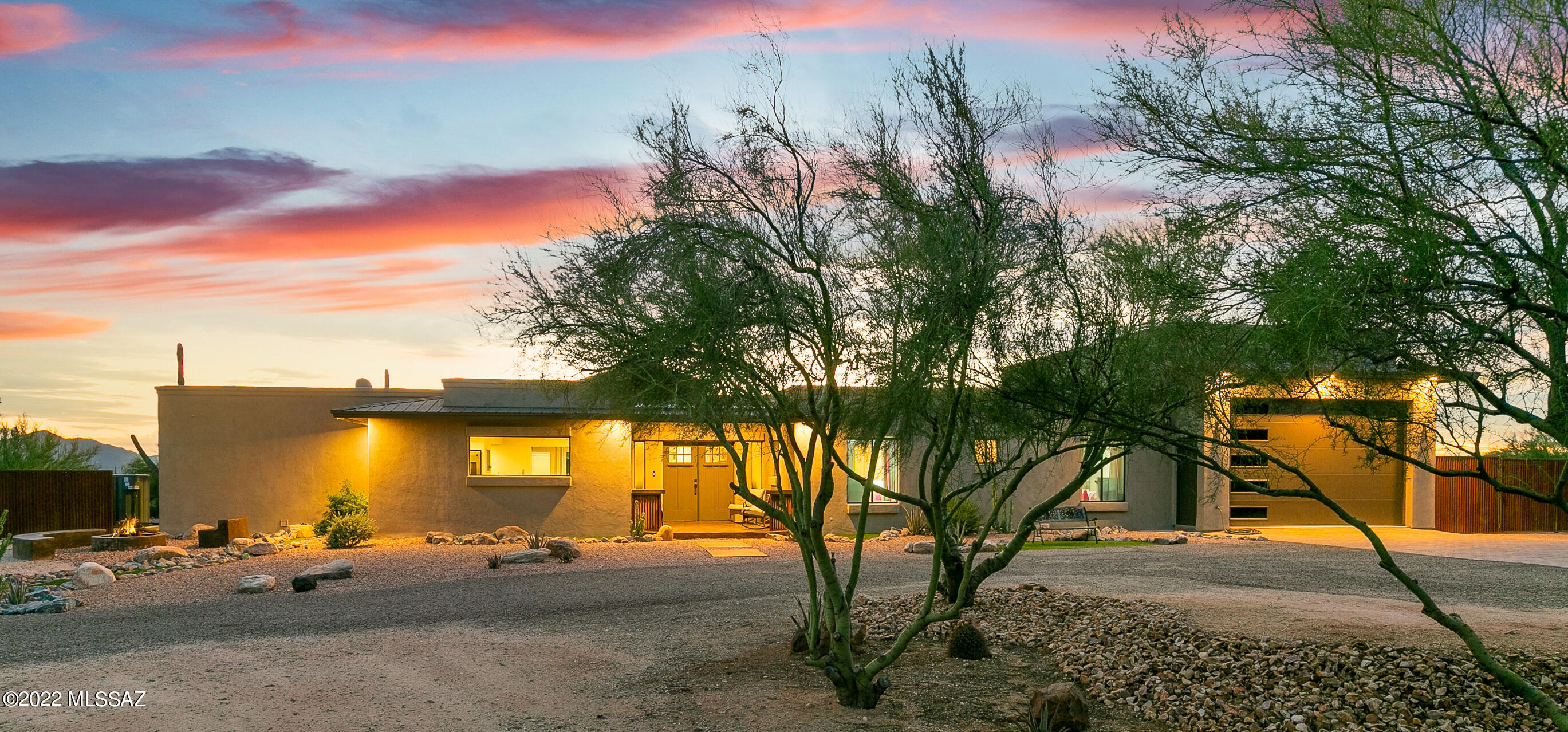 Desert Oasis Style Living! This beautiful home has been fully upgraded!  AMAZING Panoramic VIEWS, sparkling sunsets, private yard and entertaining space, and elegant layout, this is a one-of-a-kind luxury home! The exposed beams bring your eyes up to the raised ceilings and allow sunlight to brighten your space as you enter.  Upgraded tile throughout the main areas of the home.  The expanded upgraded kitchen offers expansive space for cooking and entertaining with the stainless-steel built-in appliances and double oven.
Relax in the oversized primary suite with dual closets.  The primary bathroom is like a master retreat with a large soaking tub and venetian plaster.  
The Bonus room opens to the backyard with ample indoor outdoor living space, so many possibilities for this space!