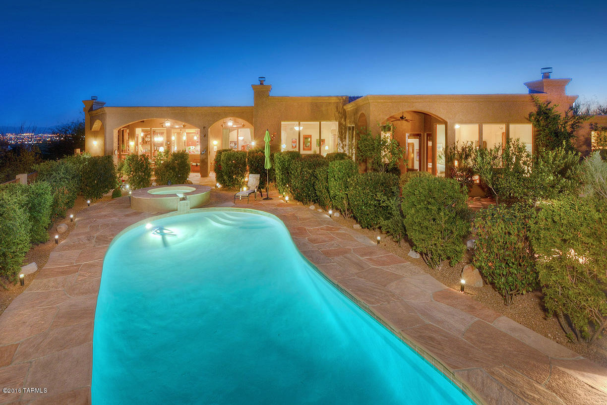 EXQUISITE NEWER SOFT TUSCANY STYLE HOME W/BREATHTAKING MOUNTAIN VIEWS IN GATED SIN VACAS , FOYER ENTRY W/CANTERA STONE, ELEGANT LIVING ROOM W/HIGH CEILINGS, FIREPLACE, WALLS OF WINDOWS, FORMAL DINING ROOM, GOURMET ISLAND KITCHEN W/ALDER CABINETS, GRANITE COUNTERTOPS, STAINLESS STEEL APPLIANCES, COMMERCIAL STOVE, BUILT IN REFRIGERATOR, BREAKFAST AREA OPENS TO LARGE FAMILY ROOM W/FIREPLACE,GORGEOUS TRAVERTINE FLOORS, 8FT. DOORS, WOOD CASED WINDOWS, 4 BEDROOMS PLUS STUDY OR 5 BEDROOMS, 5  BATHS, MASTER W/FIREPLACE, LUXURIOUS BATH, LARGE WALK IN CLOSET, FABULOUS BACKYARD WITH COVERED PATIO, POOL, SPA, WATERFALL, INCREDIBLE MOUTAIN VIEWS, VIEWS, VIEWS! FLOOR PLAN LOCATED UNDER PHOTOS, THEN VIRTUAL TOUR.