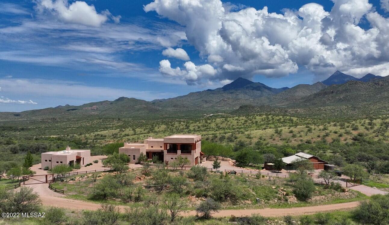 MAJOR PRICE REDUCTION!! A SPECTACULAR SOUTHWEST CUSTOM MASTERPIECE ON 39 ACRES AT THE PRESTIGIOUS & HISTORIC SALERO RANCH IN SANTA CRUZ COUNTY. The Triple JB Ranch has a stunning main house with 3,179 sq ft & a fabulous 1,030 sq ft guest house, exercise room, pool, six stall barn plus a loafing shed & drought tolerant landscaping. The home boasts 10-16 ft ceilings, a gorgeous wall of windows from the open great room & incredible views from every room. It is the perfect inside-outside flow to the mountain views that ranch living is all about. The hand plastered walls & gourmet chef's kitchen add to the luxurious feel. This meticulously built & maintained property is better than new. Excellent private well. Come see this remarkable property & experience quiet, relaxing lifestyle at Salero. Located in southeast Arizona at a mild 4,500 feet elevation, the ranch has arguably the finest annual climate in the state. This magnificent home is perfect for entertaining with plenty of gathering space inside and out. The Starlink high speed internet is fantastic and your family and friends will never want to leave the marvelous guest house. The ranch has endless hiking, mountain biking, birding and horseback riding trails. The phenomenal views, open space, peace and solitude that surrounds this home cannot be duplicated in any city setting. No expense was spared. The Triple JB Ranch is offered far below replacement cost and is ready for you to enjoy today! DO NOT MISS THE INTERACTIVE MAP AND WALKTHROUGH VIDEOS IN THE PHOTOS TAB. MOST FURNITURE IS NOW INCLUDED IN THE SALE WITH A STRONG OFFER!