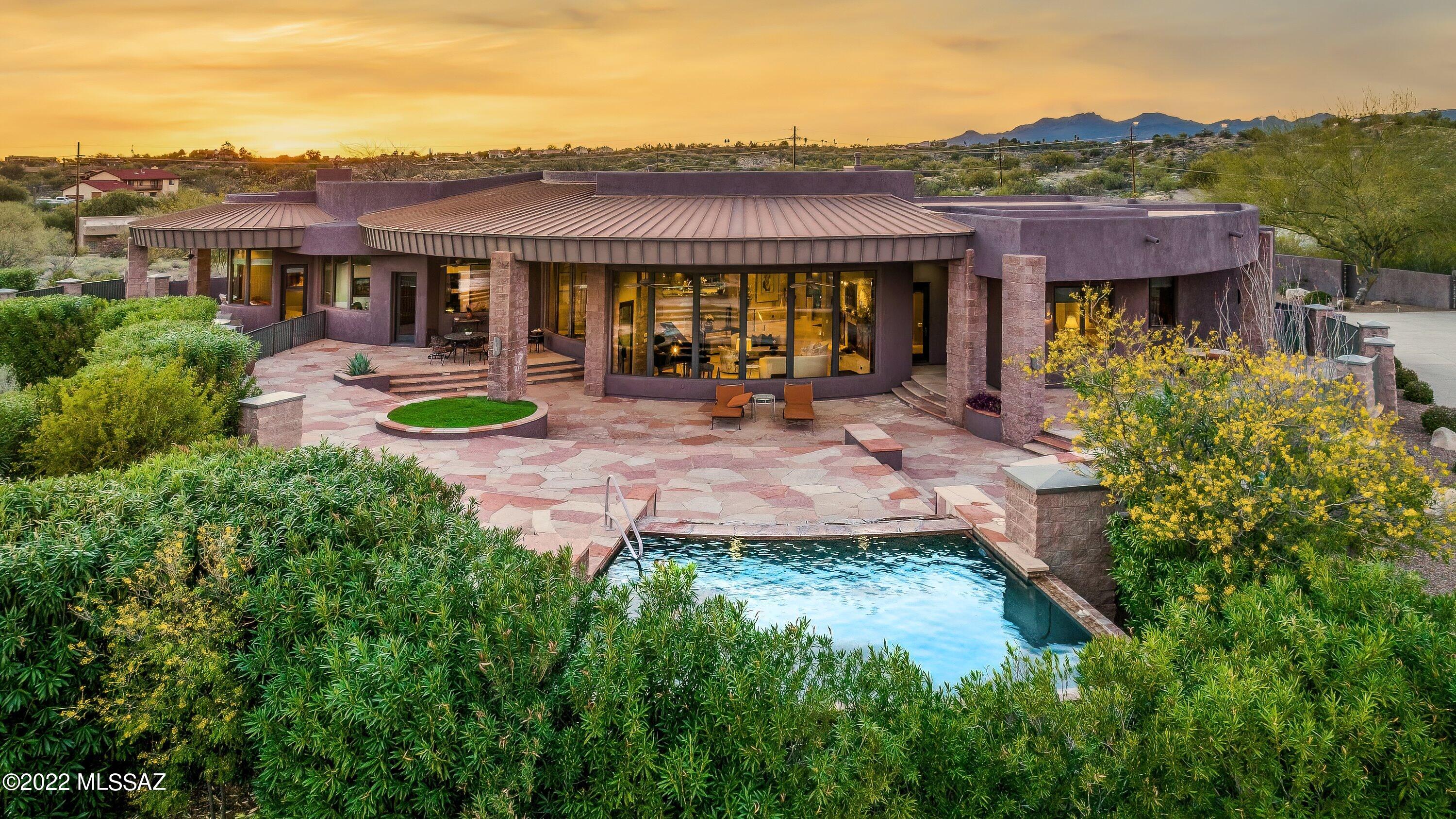 Stunning, 5BR/5BA, top of the ridge contemporary Marc Soloway designed home on 3.45 acres overlooking breathtaking city/mountain views in prestigious gated community; long private driveway, gorgeous glass entry door, gorgeous great room w/dramatic high ceilings, stacked stone fireplace, floor to ceiling windows framing mountain views; formal dining room, gourmet island kitchen w/alder cabinets, granite countertops, stainless steel appliances, cozy breakfast area, beautiful 24 inch travertine floors, master suite w/fireplace, sitting area, luxurious bath w/incredible shower, travertine thru out, large walk-in closet, huge flagstone patio w/several entertainment & seating areas, negative edge pool w/flagstone wall spillway, spa, outdoor kitchen, 3-car garage.