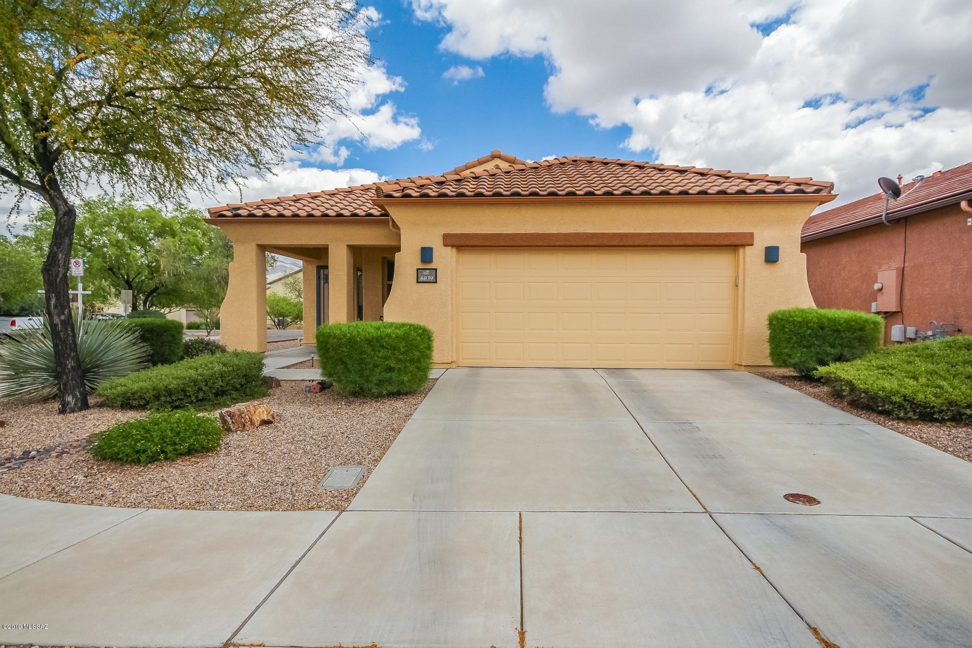 This beautiful home has been lovingly maintained by the original owners. This home is situated on a premium corner lot with no neighbors to the rear. You'll love the wood laminate floors and tile throughout the living areas. Home exterior was painted in May of 2017. The bright open kitchen has corian counters, black appliances and a large pantry.  Large master bedroom with bay window. Home has ceiling fans throughout and surround sound pre-wiring.  One of the guest bedrooms includes a beautiful built-in Office / Murphy bed! Enjoy the walking/bike trails throughout the community, multiple parks, dog park, community center, as well as the heated community pool.  This home is turn-key and includes the natural gas grill (Connected to gas stub) and all the appliances!