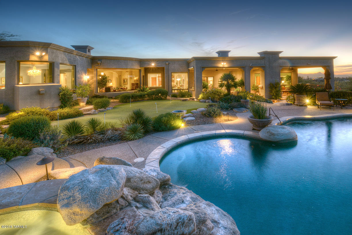 Elegant 4 Bedroom & 5 Bathroom Masterpiece in Pima Canyon Estates. Fine Finishes Throughout, This Home Features a Spectacular Living Room w/Floor to Ceiling Mountain View Windows & Fireplace,Formal Dining Room That Opens to a Covered Patio w/Fountain & City Lights,Spacious Island Kitchen w/Magnificent Mountain Views That Opens to The Family Room w/Custom Built-In’s & Fireplace,Luxurious Master Suite w/Huge Mountain View Windows,Oversized Walk in Closet,& Bath w/Spa Tub & Walk Thru Shower,Executive Office/Den w/Built-In’s,Separate Guest House w/Living Room,Kitchen,Bedroom,& Bath w/Steam Shower,4 Bay Garage w/Epoxy Floors & Large Storage Room, Private Outdoor Living Space w/Oversized Covered Patio,Rolling Shade Screens & Fireplace,Sparkling Pool,Spa,Putting Green,& Commanding Mountain Vi