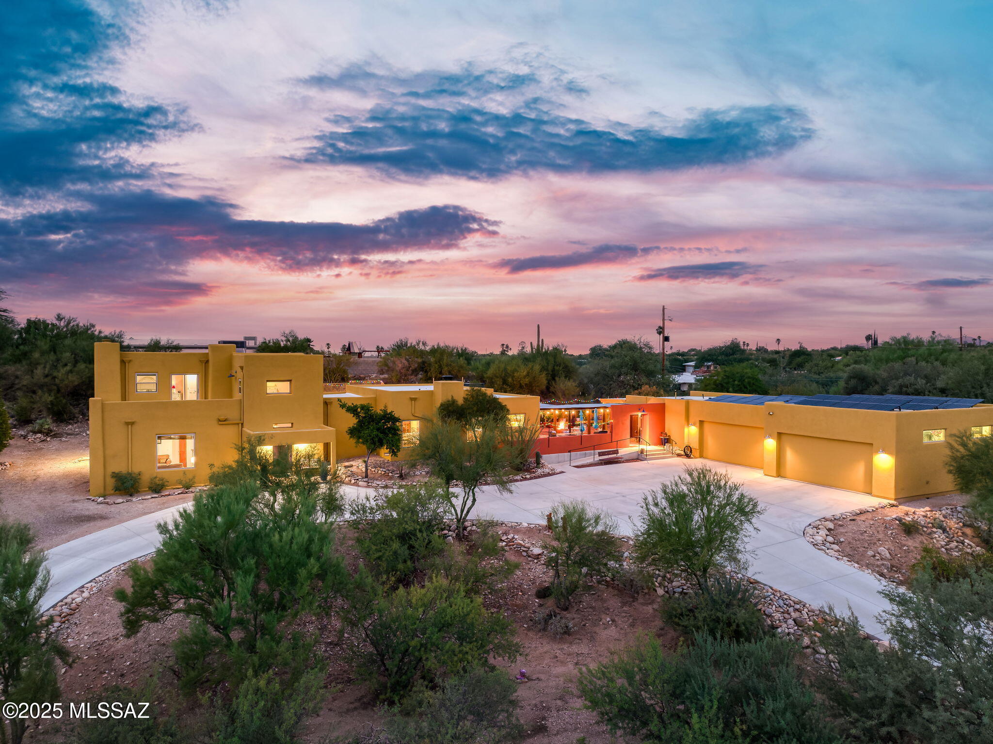 This beautifully updated home sits on a private hill with stunning city, mountain views and no HOA. Designed for flexibility, it's perfect for multigenerational living or rental income, thanks to a newer build guest house. Enjoy low-maintenance living with owned 12 kW solar, new HVAC units, new appliances, new water heater, and whole-house water filtration. Inside, you'll find new LVP flooring, a refreshed marble fireplace hearth, and new exterior paint. The 4-car garage features epoxy floors, extended height/depth, and an included car lift—ideal for auto enthusiasts. A large, paved driveway offers ample parking. Out back, relax on the new extended pool deck with retaining wall, enjoy the landscaped yard, and take advantage of the new pool pump. With no HOA, energy efficiency, and a flexible layout, this home is the perfect blend of privacy, comfort, and functionality.