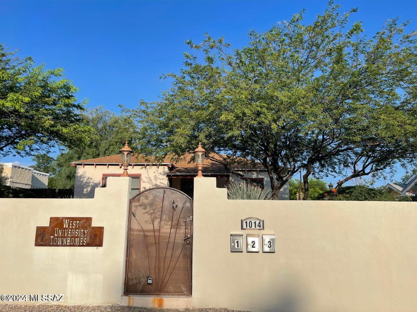 Fantastic opportunity to own a wonderful triplex with total 9 bedrooms & 3.5 bathrooms that situated on a large corner lot with 6 on-site gated parking spots. Amazing location, close to everything. ONLY 1.2 MILES TO THE UOFA , 1 mile to Tucson High Magnet, 1 mile to Downtown, 2.4 mile to Banner hospital, 2.3 mile to St Mary's hospital, across from De Anza park, close to I10, Reid park, 4th Ave, bus stops, schools, businesses, restaurants, shopping, entertainments, etc. Lovely townhome style property, each unit has its own gated entrances & enclosed yards. All units were renovated in 2008. Each unit has its own AC, water heaters & washer/dryer. Rent out all 3 units or stay in 1 & rent out 2 others. Lots of potentials! out other two units for rental income.