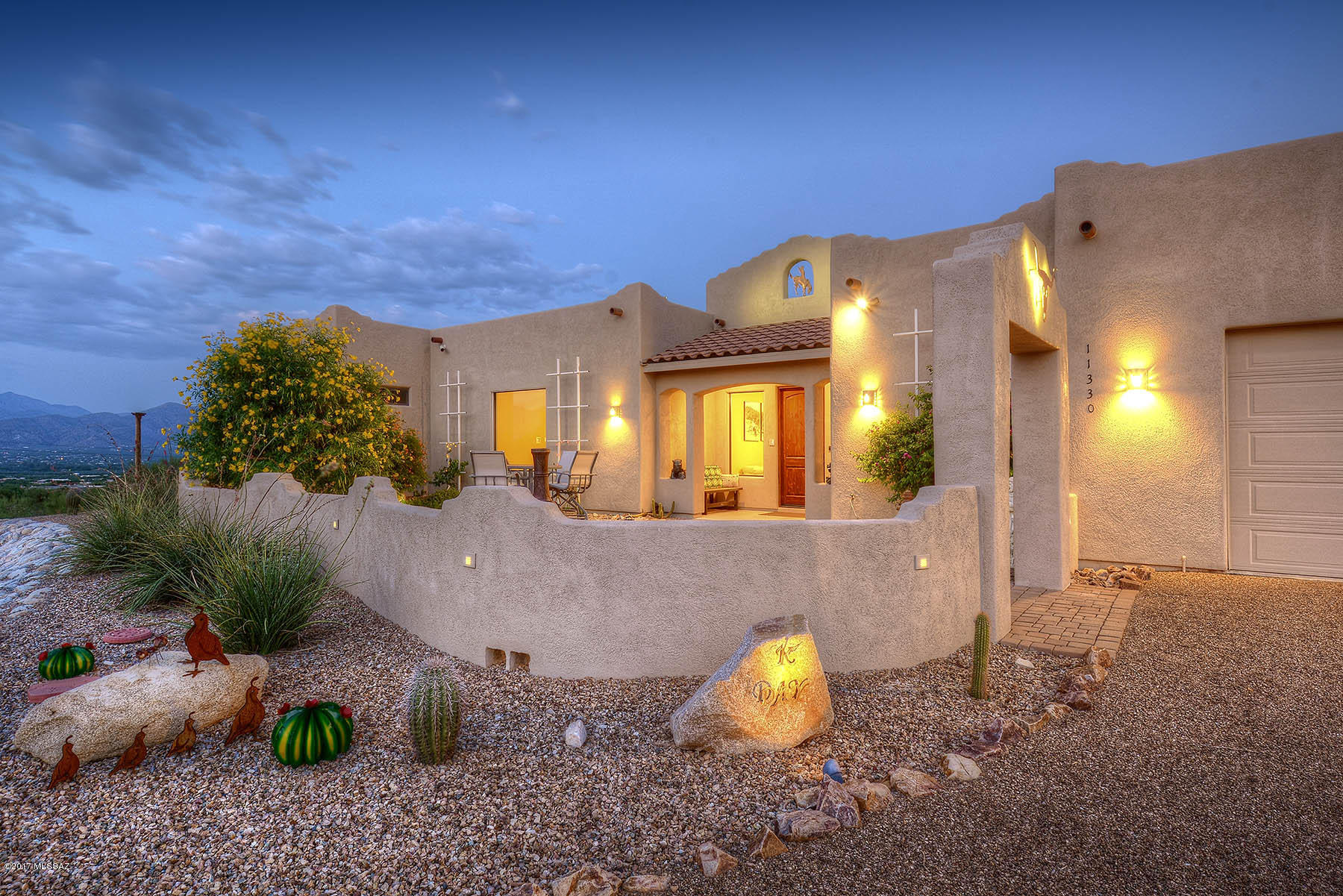 Outstanding 2009, 10 bedroom, 7 1/2 bath home on 5.77 acres with sweeping Catalina and Rincon Mountain views.  Property is an ideal multi-generational home, possible group or assisted living home, extended stay home for aging parents, rebound kids, etc. Entry into parlor leads to great room with gourmet kitchen, granite counters and stainless steel appliances. Built around a center courtyard/garden, this one of a kind partially handicapped adapted home offers a 4056 sqft main house with 4 bedrooms, attached 1102 sqft guest suite #1 and attached 1066 sqft guest suite #2. Guest suites have living areas, 2 bedrooms, baths and breakfast areas. Additionally there are 2 bedrooms and an office/craft room off the center courtyard. All on one level with no steps and exceptional views from all rooms