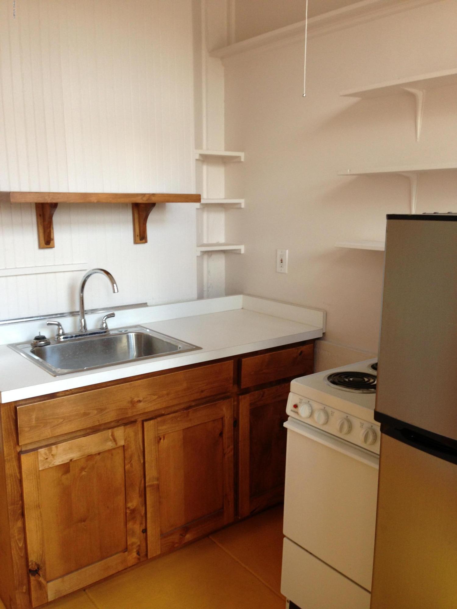 month to month studio  Charming studio near U of A.  This studio has one bath, concrete floors, window ac, gas heat, and a small backyard. Tenant pays their own utilities.  If you need to park a car, Tenant will have to get a pass from city of Tucson, at their own cost. 740 E 8th Street is the right hand side of the duplex.