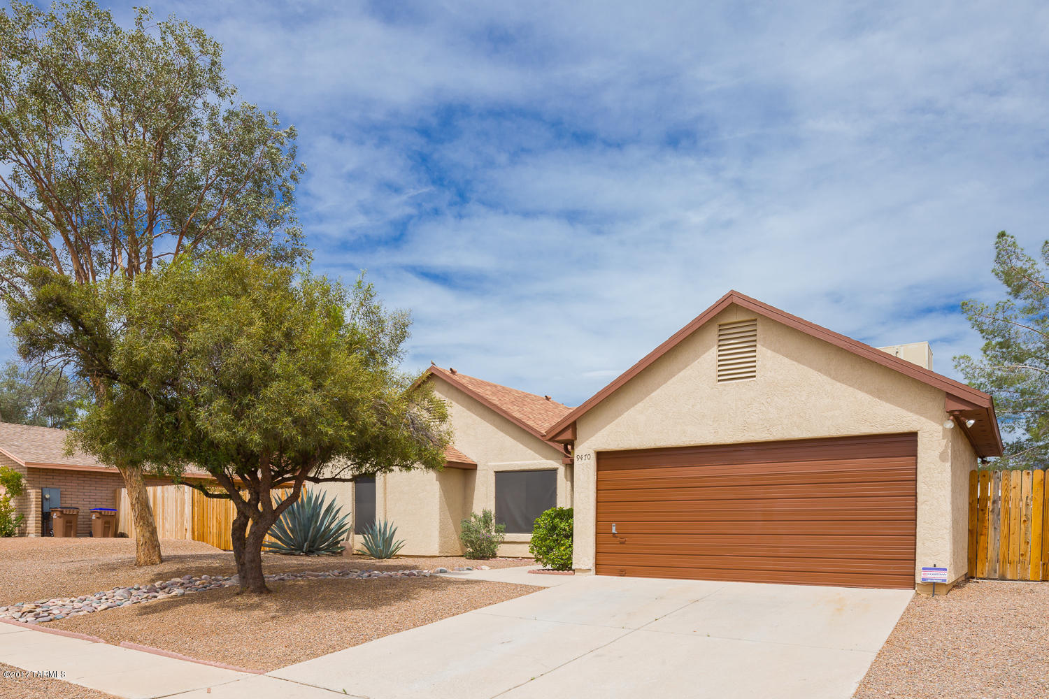 This nicely upgraded home is ready for you to move right in!  Brand new carpet throughout the house. Fresh paint and landscaping. The backyard is enormous! Two car garage, nice open split floor plan. Drive through gates on both sides of the house.  Master bedroom has a walk in closet. Nicely updated kitchen. Tons of shade.  Make this home yours today!