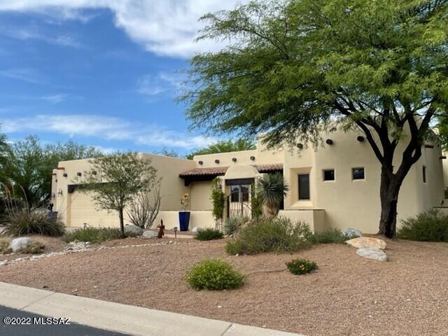 This beautiful home has a great combination of comfort and style – includes a circular entry foyer, customized kitchen, upgraded master bathroom, gated entry courtyard with fireplace and separate casita. Take a vacation in your own backyard oasis, complete with custom spa overlooking the sparkling pool and mature landscaping.
Stunning bright kitchen with new cabinets, SS appliances, eat-in quartz island. Bonus room located off the dining-kitchen area can be used as a den, studio, or family room. Enjoy the light and open living room with a focal point fireplace with the rich texture of stacked stone. Primary bathroom with a new free-standing soaker tub, tiled shower, double sink vanity and walk-in closet. Inside laundry room with washer & dryer. Separate large guest Casita, located off the courtyard.  Oversized three car garage with coated garage floor.  Home is offered unfurnished, but many of the furnishings are available for purchase on a separate bill of sale.