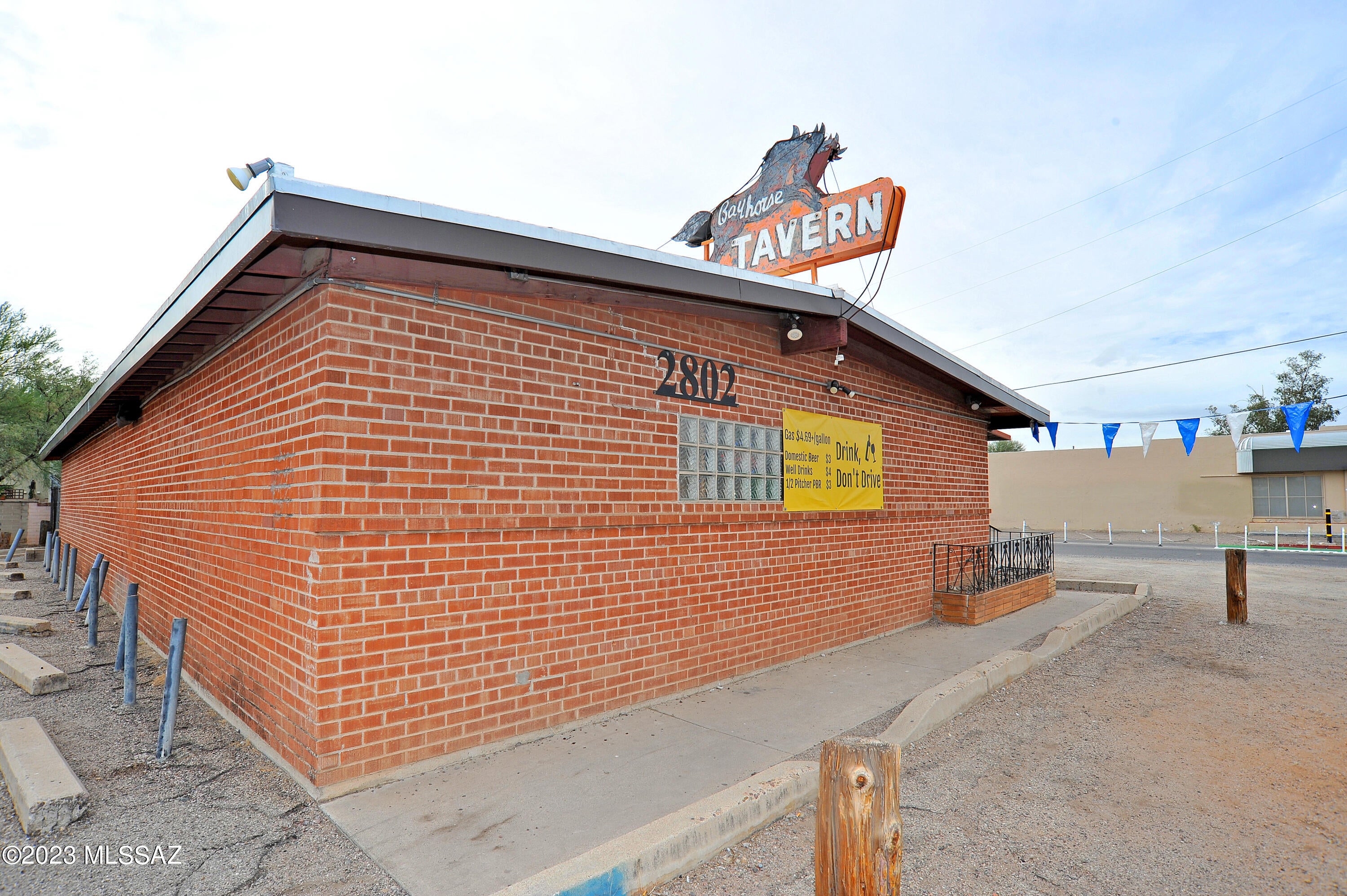Double brick building, C-2 zoning, on two lots totaling over 12,000 square feet providing plenty of parking. Well-kept with upgraded electrical, roof, HVAC, and sewer lines. That's just the boring nuts and bolts fundamentals though, what you're buying is an authentic piece of Tucson. Offered as a fully operational tavern business which will include an unblemished liquor license (one of the 3 oldest in Pima County) and everything in the bar you'd need to continue the legacy of this storied watering hole. Established in 1948 and located in its current location since 1958, The Bay Horse Tavern has maintained its allure and charm under its second owner since 1982. It's now time for a new owner to carry on the legacy of what was voted Arizona's best dive bar.