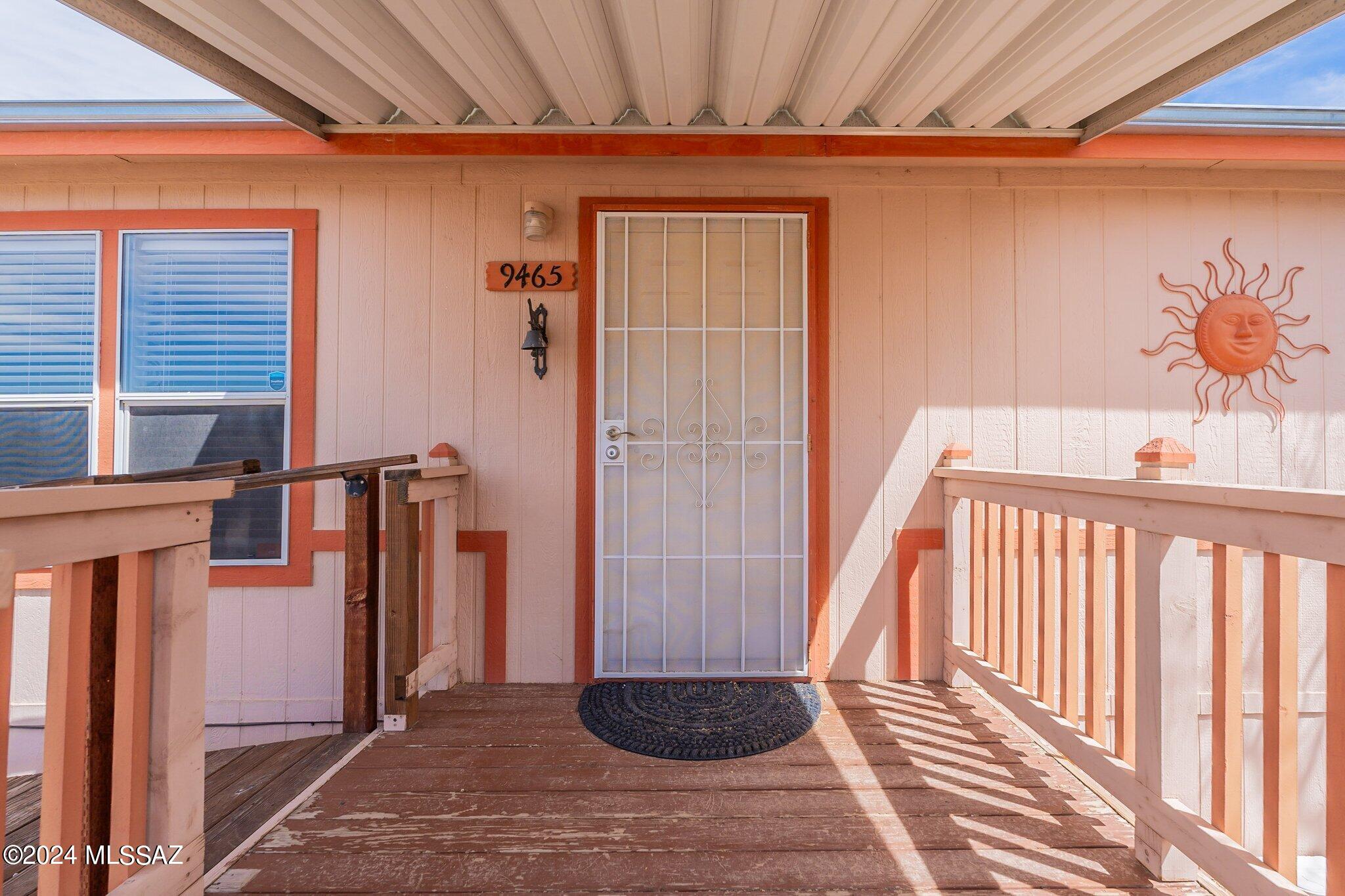 A charming 960 sq.ft, manufactured home on a large lot with amazing views! A large, covered patio and deck off of the back of the house, perfect for entertaining. With this large lot there are many options for storage as there is RV parking on the side of the home, 1 storage shed, and a workshop in the backyard plus room for 2 cars under the carport. The AC unit is from 2019. Come see this inviting home!