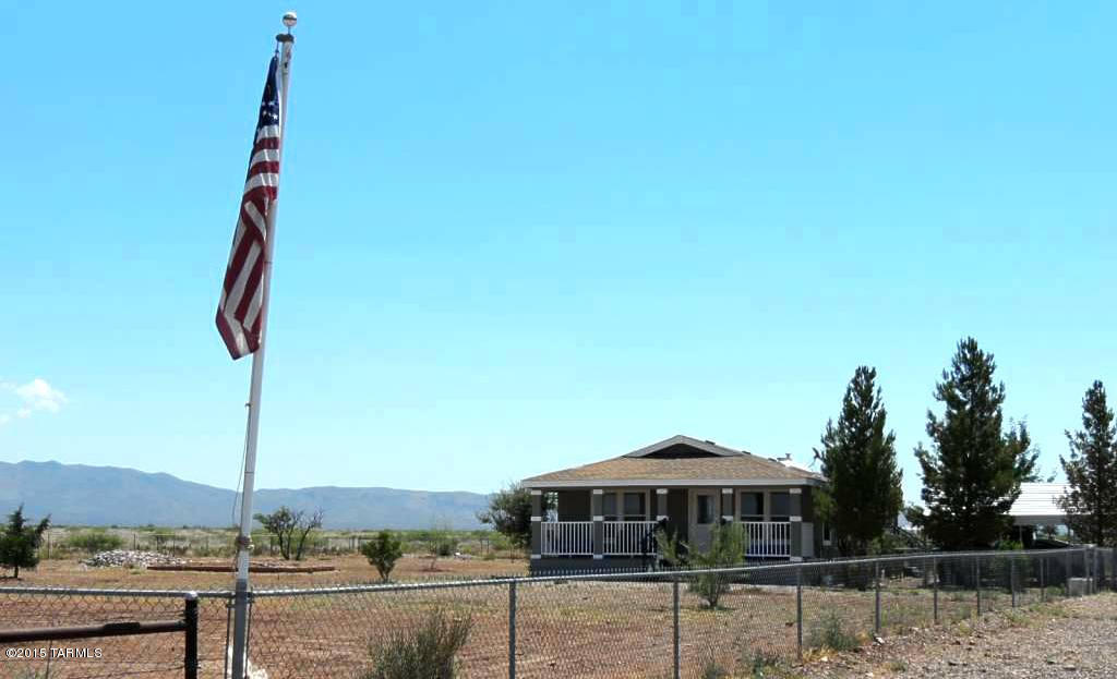 Home now offered on 41 acres for only $159,000!  You really need to see this property TODAY!  2006 CAVCO, 1,950 sf, 3 Bed (Optional 4th)  2 Bath - freshly painted inside and out!  The kitchen is very large with beautiful cabinetry.  30' x 40' SHOP - all on 84 ACRES!  All appliances can be negotiated.  PRIVATE Well. Super easy access on Hwy 191.  Only 20 miles to Douglas and all services.  A little more than a mile south of Davis Rd in McNeal.  The mountain views are AWESOME. Seller is willing to pay up to $2,500 toward Buyer Closing Costs!  Also, see MLS 21517442 for home on 84 acres for $199,000.  Click on the virtual tour for more pictures.