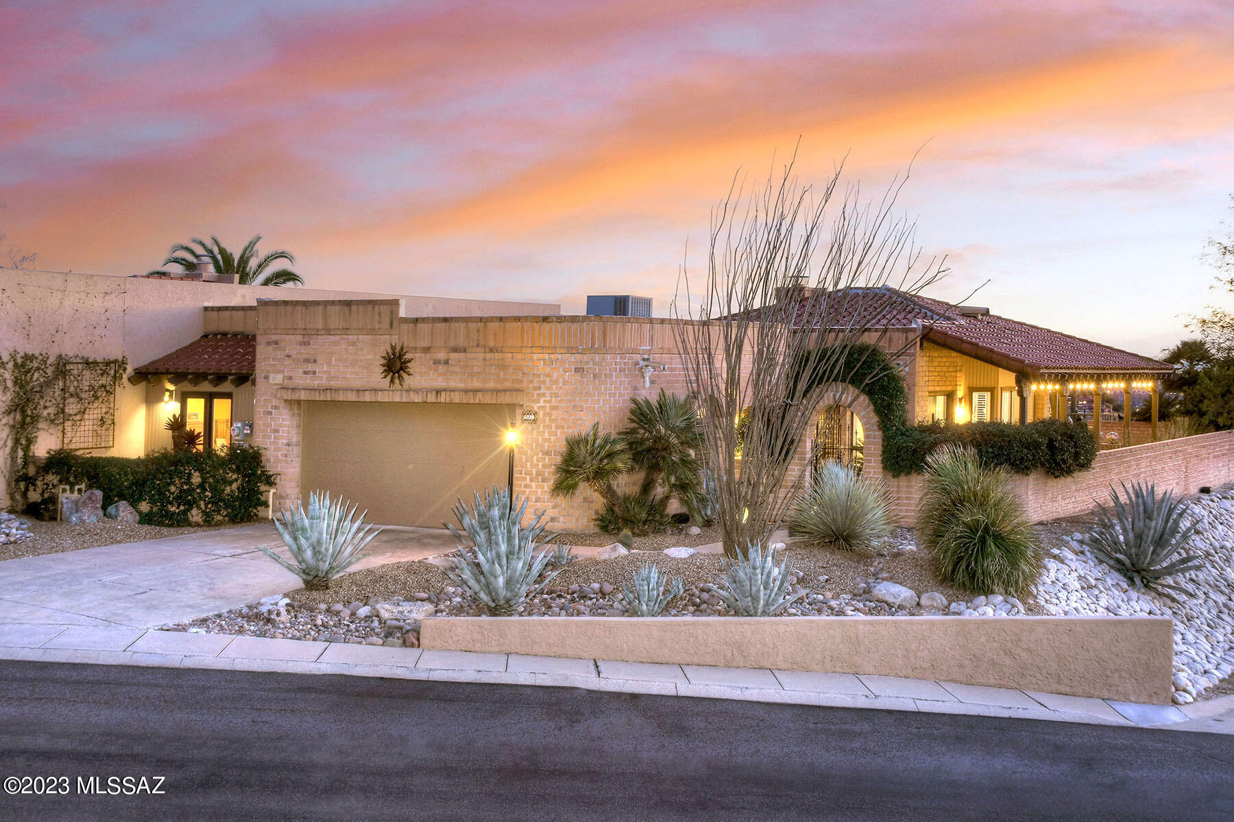 From the moment you enter this warm and inviting home, the vistas embrace you.
With only desert and the twinkling lights of Tucson to the south and the Catalina Mountains to the north, this very private residence is a rare offering!
Countless tasteful upgrades with attention to detail both inside and outside make it move-in ready.
The living space is extended outdoors with wraparound patios,  thoughtful, low-care landscaping and lovely updated pool.
A family retreat for over 30 years, this property has been loved and well maintained. Make it your own!