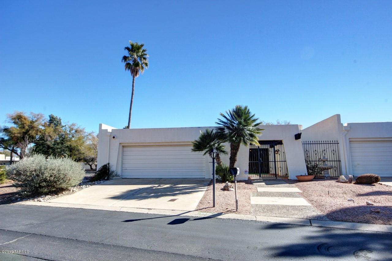 Lovely Spacious Townhome in Desirable Dorado Country Club Estates.  2102 Sq Ft, 3 Bedrooms/3 Full Baths.  Small entry courtyard w/2 security drs.  Large foyer to very spacious dining room/living room, light & bright w/ clerestory windows & soaring ceilings.  Originally purchased was 2 Bedroom + Den.  Owner constructed wall in Living & made Den 3rd bedroom & added fireplace to LR.  Master/2nd bedroom are en suite w/ 3rd full bath in hall. Newer appliances, HVAC & water heater.  Electric upgrades.  Security system & 2 brick patios great for relaxing & entertaining.  Lots of storage garage & off east patio.  Guest parking across street.  Community pool/spa & golf course getting new clubhouse 2017.  Beautiful setting in location close to shopping, hospitals, restaurants & more!