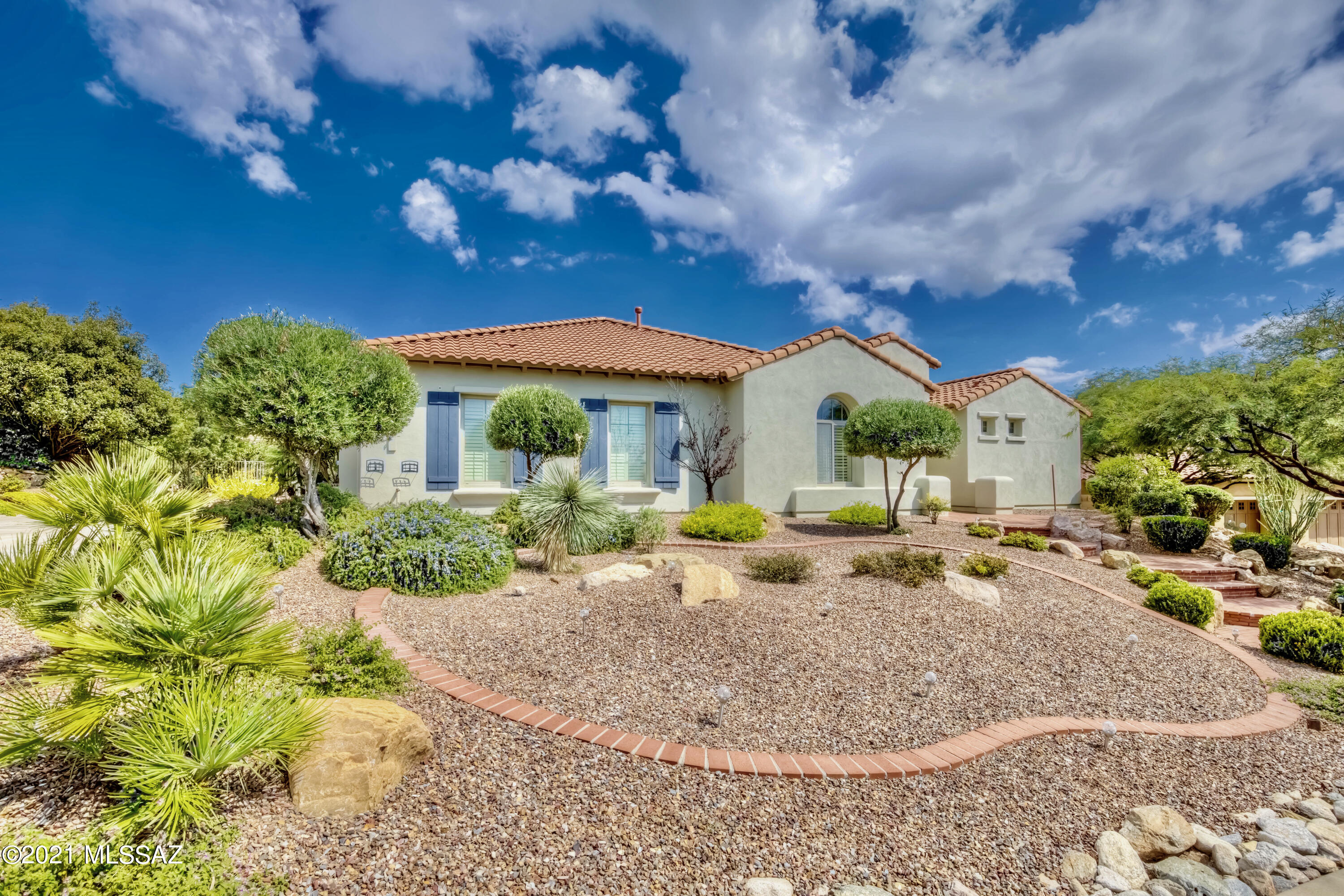 PRICE REDUCTION! Move-in to your home before the NEW YEAR. Over 3300 SF this Sonoran model is spacious, open & airy & takes full advantage of the views, from the inviting great room's wall of glass, to the open dining room & large island kitchen. Gourmet kitchen has granite counters, stainless appliances, walk-in pantry & beautiful cabinetry. Owner's retreat has views, en-suite w double vanities, large separate shower, soaking tub, & large walk-in closet. Private guest suite w/en-suite bathroom, powder room, den/hobby/office, large casita w/bath, + 3 car garage completes this home. Enjoy entertaining in the outdoors with unobstructed GOLF VIEW, LAKE VIEW, & MOUNTAIN VIEWS beyond. Rare lot to go on Market. Don't miss out!