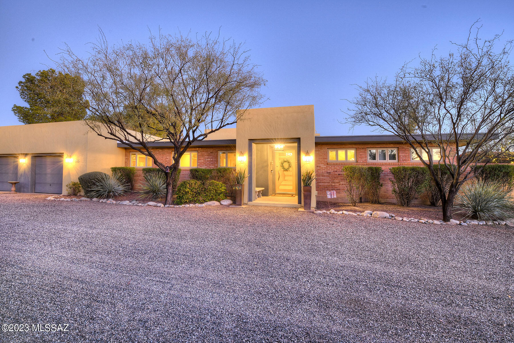 Colonia Solana beautiful 1949 Modern-Contemporary, originally designed by architect Merritt Starkweather. This 3776 sq.ft home offers a large great room floor plan with a FP.  A well-appointed cook's kitchen; Viking and Sub-zero appliances: 6 burners, griddle, pot filler, 3 ovens, microwave, and island bar with vegetable sink. Separate wet bar with wine cooler and large laundry room with refrigerator and cabinets. Luxurious primary bedroom w/fireplace & office area also enjoys an ensuite lavish bath, spa tub, large steam shower with bench seating, double vanities & walk in closet. Split floor plan offers a 2nd primary bedroom with ensuite bathroom, plus 2 bedrooms that share a Jack & Jill bathroom.  Polished caramel colored concrete floors, natural stone & glass mosaics throughout imparts a neutral palette. Whole home sound, clerestory windows, high ceilings, large walls of dual pane glass, natural lighting and large walk-in closets are a few of the elements that perfect this stunning home.  Private multi-use media room with built-in surround sound off the interior courtyard which boasts a fountain, covered patio with misting system and a mural by Rocky Martinez; adjacent to a 3/4 bath with 2nd steam shower. Backyard has an outdoor fireplace, covered patio, trapezoid Pebble Tec pool, outdoor kitchen area w/BBQ and sink. Walled and private with 8x10 storage shed in back area.   Oversized 2 car epoxy-floor garage with shelving and benches on .41 acre lot in the center of this lovely historic neighborhood.
