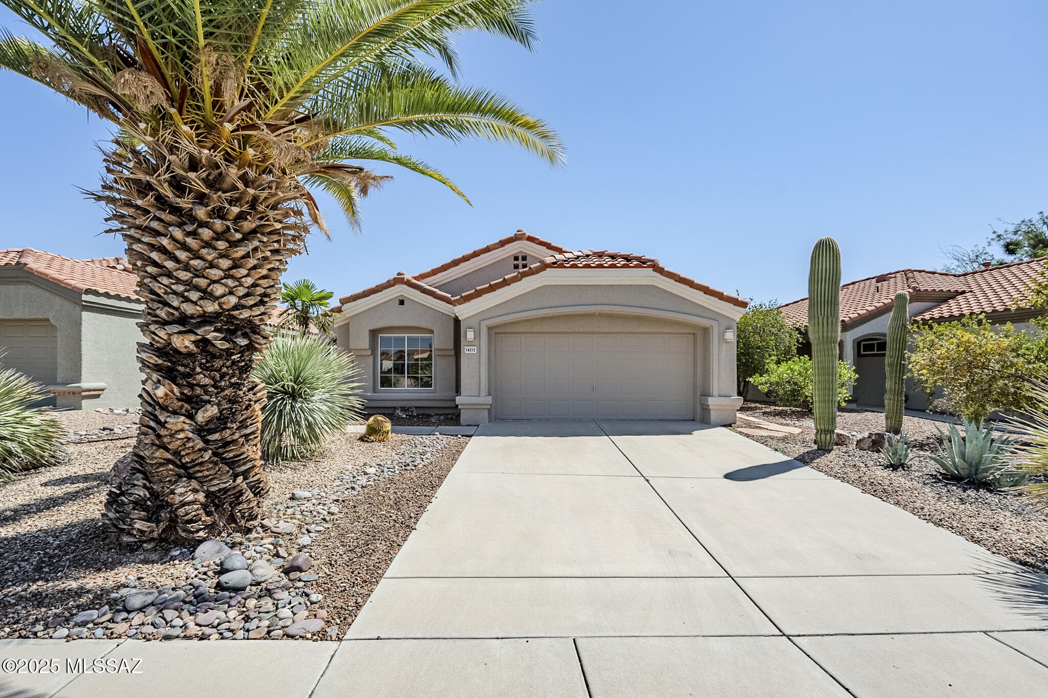 This home is situated in a quiet, low traffic area of the community that offers many amenities. The property boasts new tile flooring, providing a clean and contemporary aesthetic. The home is filled with an abundance of natural light, creating a bright and airy atmosphere. The updated bathroom offers a walk-in shower. The split-bedroom floor plan offers privacy and flexibility, with the primary bedroom located on opposite sides of the home. Kitchen dining space professionally extended. Flagstone rear patio. New roof 2017, regularly maintained, new laundry appliances and gas stove. Garage door has new hardware and new motor. HVAC flexible duct replaced in 2026. One-owner property, meticulously maintained and never rented.