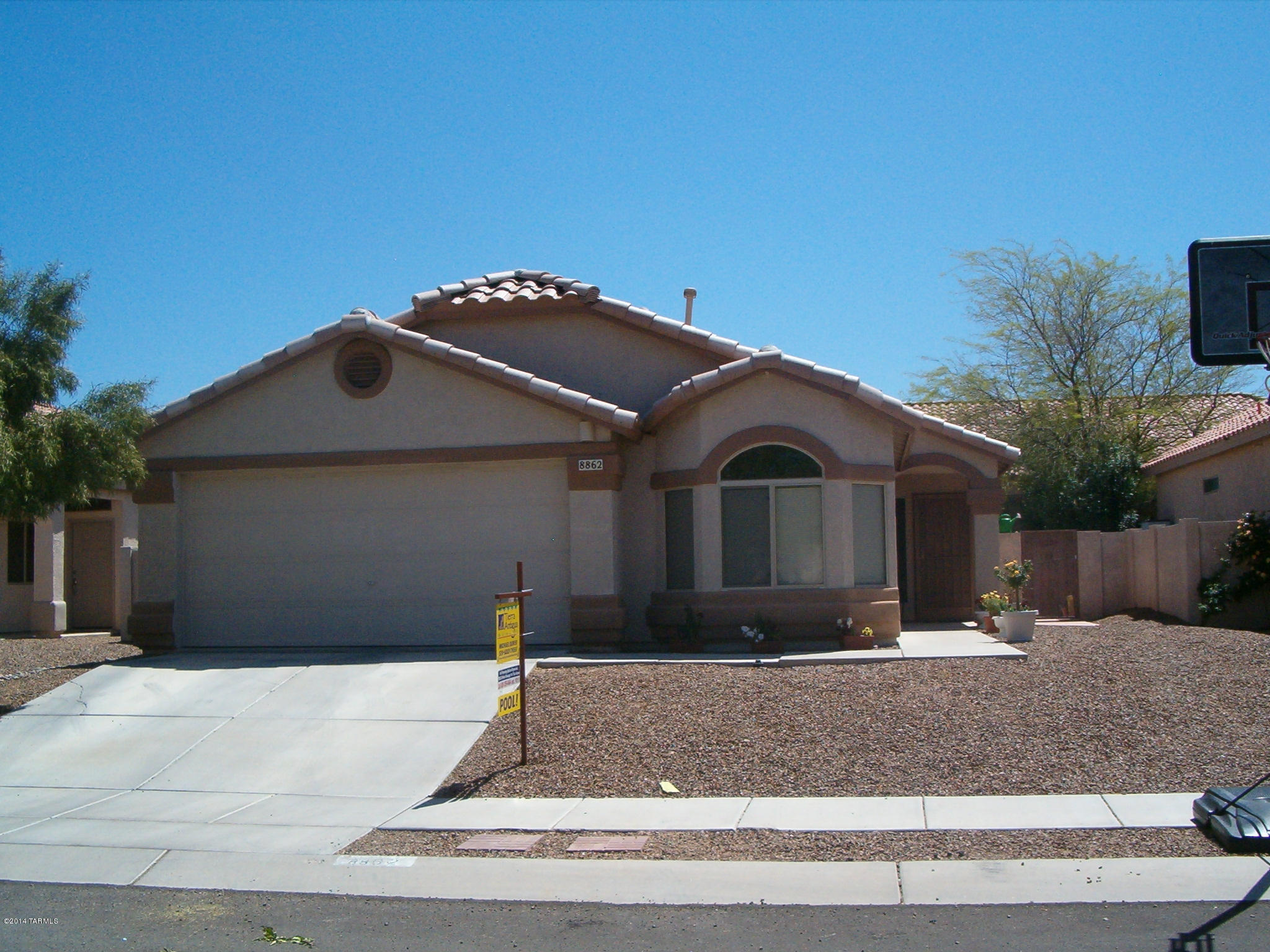 Lovely 4 bdrm. 2 bath, completely tiled, with a 2 car garage. Come enjoy the beautiful swimming pool and built-in BBQ for great family entertaining.