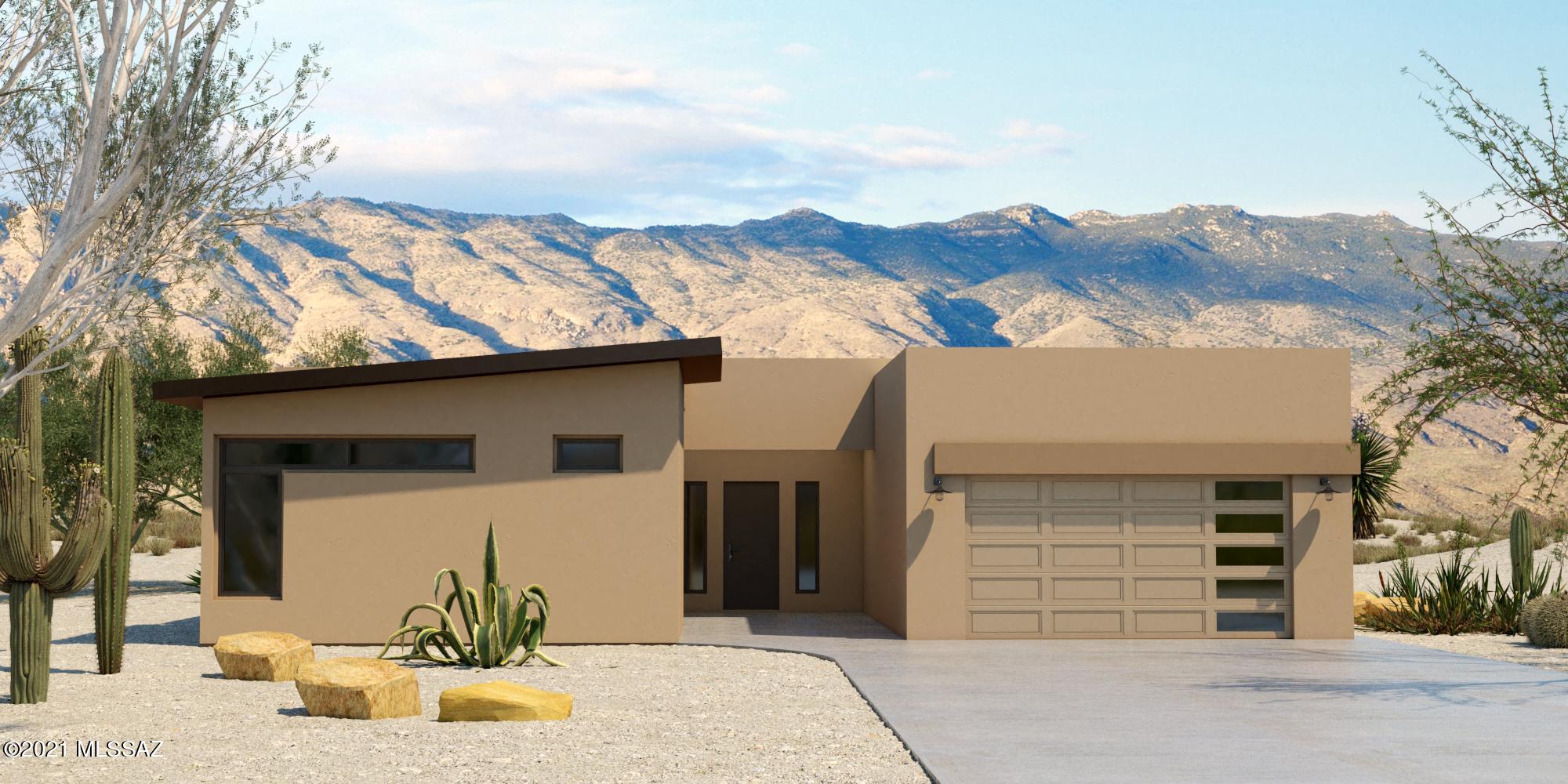 This popular Ocotillo home will be move in ready Q1 2022! This stunning home has been intentionally designed by our in house design team and highlights include 12' ceilings, a gourmet kitchen, luxury quartz counters and cabinets throughout the home, an extended length 3 car + tandem garage and a secondary entrance for an attached ''casita''! The backyard has views of the Catalina Mountains, Dove Mountain Golf Course and the Tucson Mountains, truly unbeatable sunsets! Do not wait to visit this home and make it yours!   Membership Initial fee at the Dove Mountain Golf Club is included with your home purchase! This home is under construction.The list price is subject to change based on designer selections and building materials. The image is a rendering and may not be an exact depiction