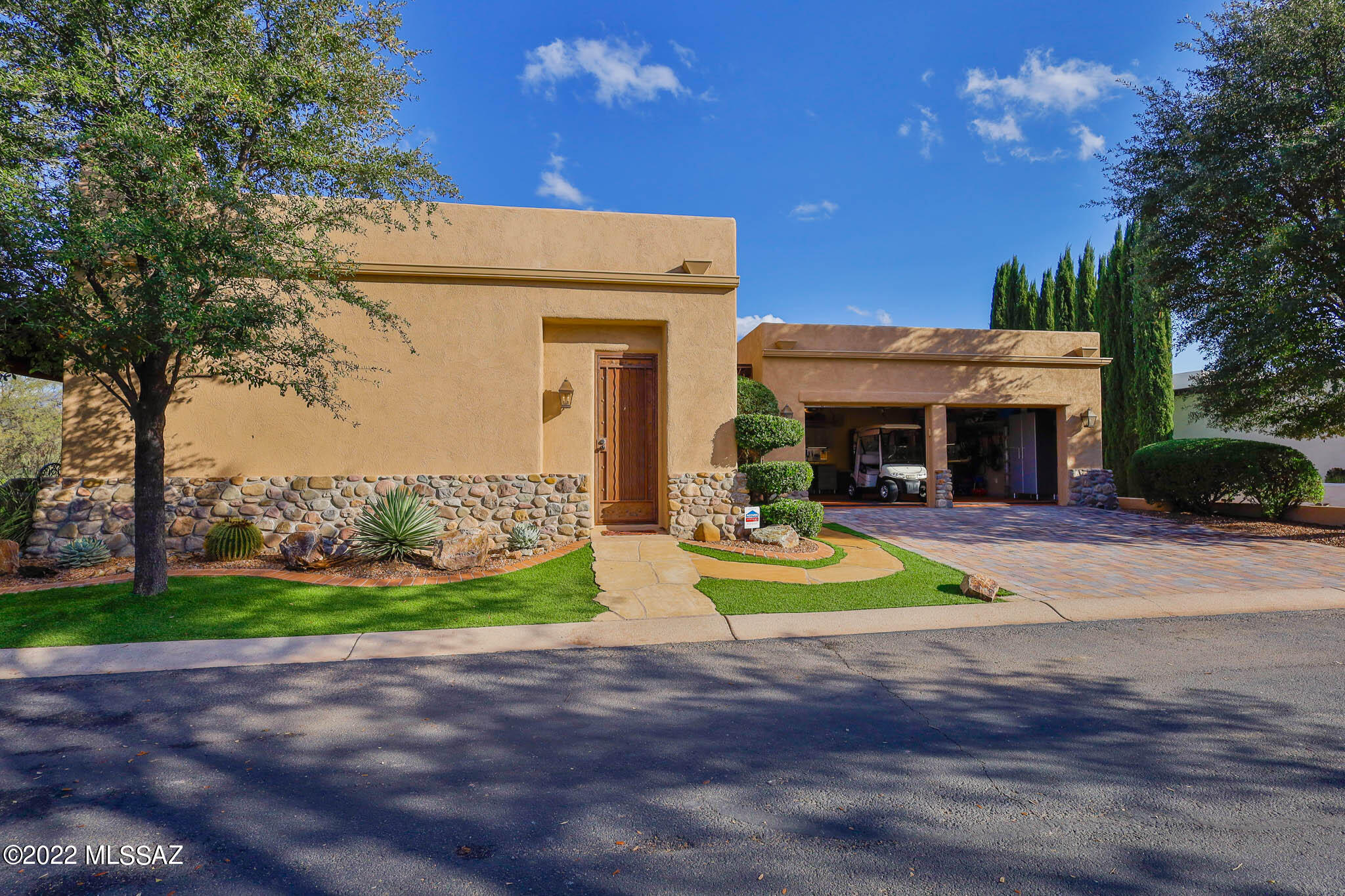 Exquisite upgraded custom home on the Anza 1 fairway of the Tubac Golf Resort. 
A stunning Latia covered front patio entry w/custom iron gate greets this beautiful 3 BR, 3.5 BA main home and a large (515 sq/ft) private Casita. Travertine tile throughout.  Kitchen w/Viking, Subzero appliances, large island & eat in area. Fabulous living/great room off of the kitchen with gas fireplace. Formal dining area, (2)offices, laundry room off the garage. Extensive upgraded garage and utility area. Spacious Casita features a walk in shower, double vanity, coffee bar, fridge, gas fireplace. Impeccable (3) patios & landscaping.  Skydeck offers panoramic mountain & golf course views. Incredible patio areas. Great privacy, orientation and location. Some furnishings available on a separate bill of sale.
