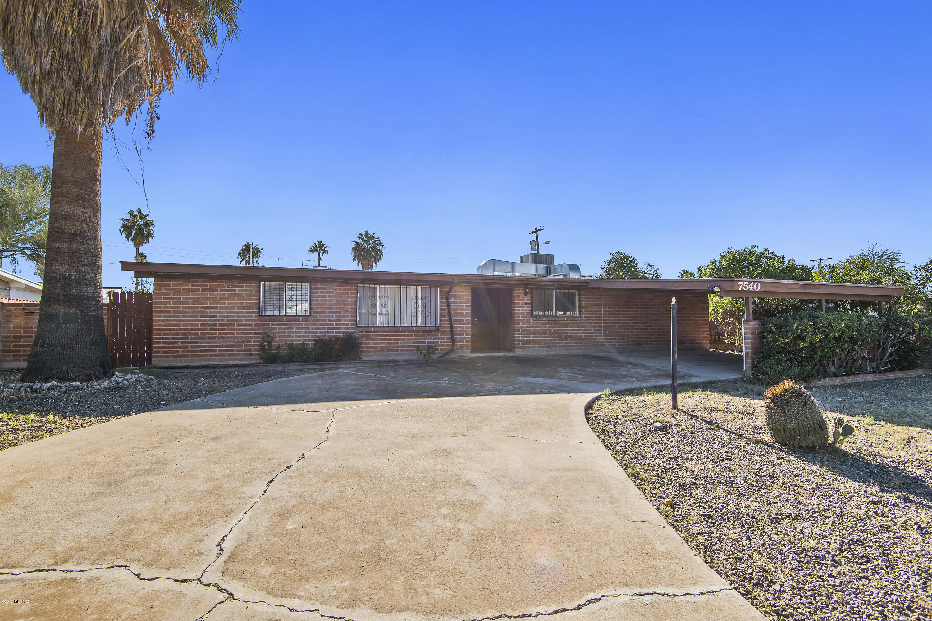 Charming remodeled 3 bedroom, 2 bath with new paint, new carpet, all new light fixtures; nice kitchen with granite countertops and maple cabinets; seller is in process of replacing range and dishwasher. Lots of space with a family room, living room and two dining areas. Covered porch runs the full length of the house, extra storage out back. This home won't last long, make it yours today!