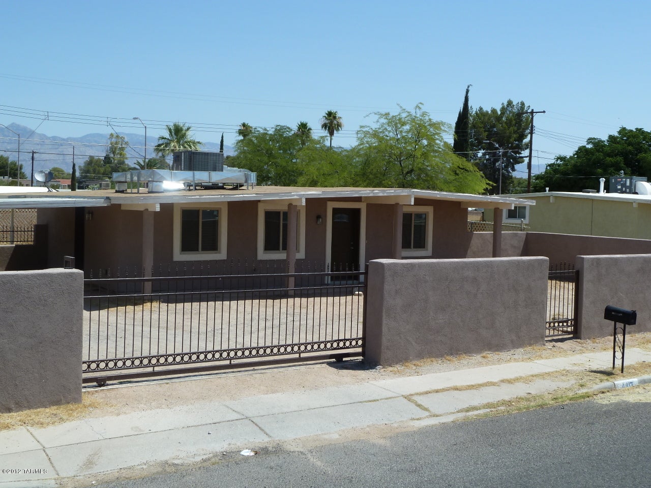 Midtown STUNNER! Eloquent 3BR home in quiet and convenient location! Gorgeous tiled floors! Upgraded kitchen with updated appliances (including a dishwasher!) and magnificent cabinets! Huge bedrooms ensure everyone gets plenty of space! Enormous, walled backyard is perfect for kids or approved pet! Covered parking spot with brand new drive gate installed on front yard for added security! Don't go missing out on this great deal! CALL TODAY!