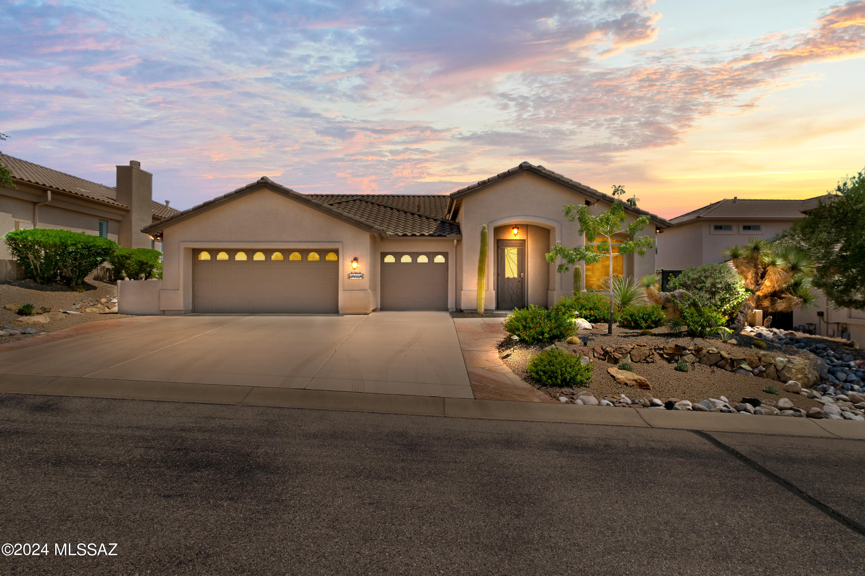 SPECTACULAR panoramic Catalina mountain views and uncompromised privacy from this updated, upgraded Cheyenne model home (3 Bedroom / 2.5 Bathroom / 2,631 SF / 3 Car Garage). This highly energy-efficient home is your oasis. 
With an oversized .22-acre lot, this sanctuary backs up to over 100 acres of natural open space and golf course property, ensuring no buildings or homes behind you. 

The heated spool with built-in water feature adds to the milieu, while new landscaping and new irrigation throughout the property keep it low-maintenance. 

The new remote-controlled exterior roller shade expands your outside enjoyment options for entertainment or private time. 
 
This highly energy-efficient home has 2x6 construction, Low-E glass, solar tubes, gas fireplace, newer hot water heater and LED lighting throughout. BRAND NEW furnaces and a/c units with 5 years of PREPAID maintenance provide years of worry-free living.  
 
For those who need more garage space, this house has it!  A 3-car expanded garage with epoxy floor and cabinet storage. A new garage ready refrigerator with freezer completes the package.
 
Newly fully remodeled bathrooms.  All bathrooms have Cararra marble counters and dual flush toilets.  Guest bath showcases an enlarged walk in shower with rain head and hand held shower wand.  The owners spa like bath includes a huge walk in shower with rain shower head, hand held shower wand and large soaking tub.  His and her large walk-in closets offer ample storage.

An updated kitchen has granite countertops and newer stainless steel appliances including a gas cooktop with a custom vent hood. 
 
This home is truly move-in ready. All furnishings available on separate bill of sale.