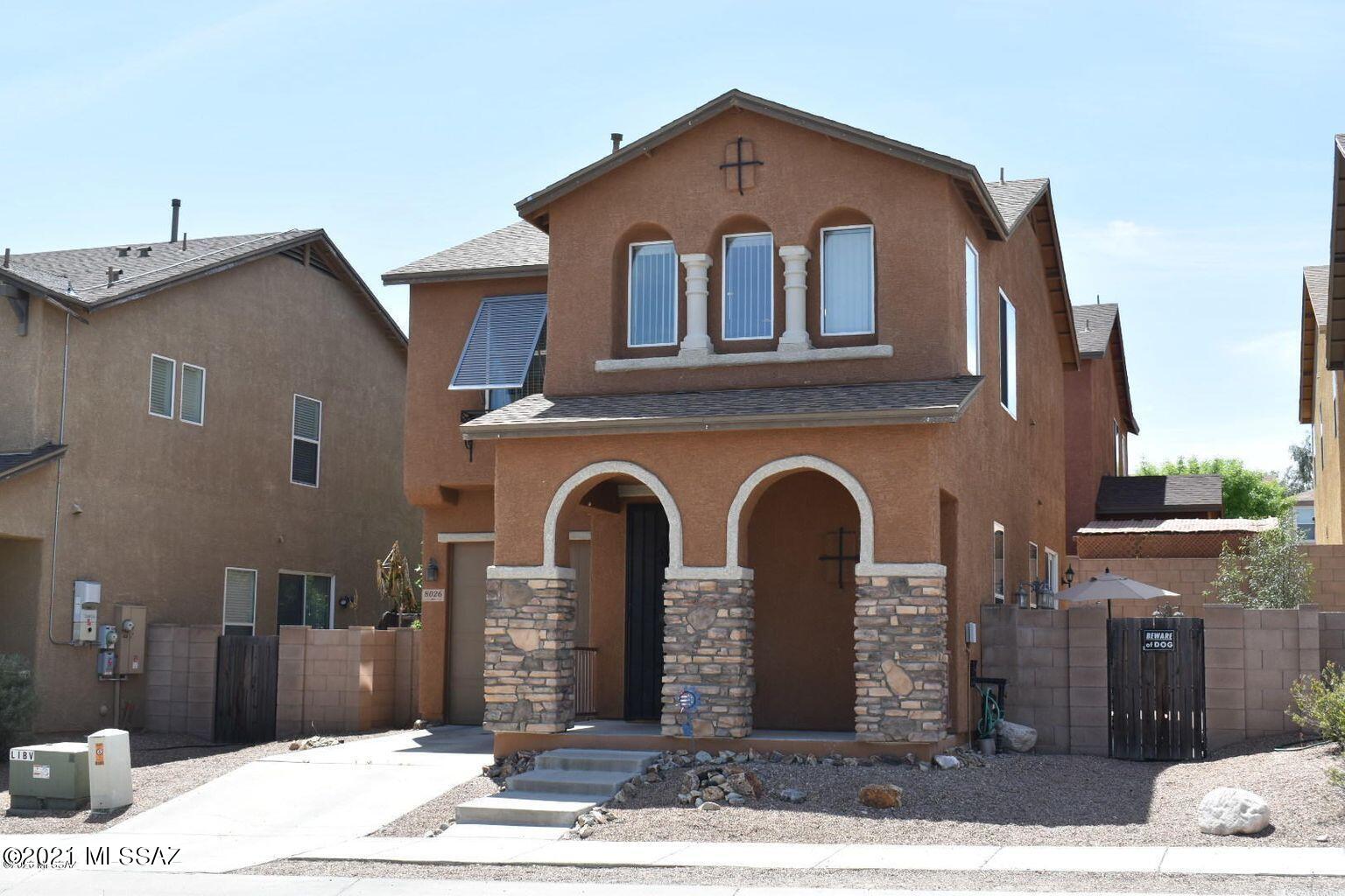 This lovely, well-maintained, two-story, two-bedroom home is nestled on Tucson's Eastside. Enjoy the second-story loft, perfect flex space for a home office or secondary living space, yoga/excercise, learning area or zoom room. This home has tile throughout the first floor, wooden cabinetry, and stainless steel appliances in the kitchen. The front and backyard are xeriscaped for low maintenance and an even lower water bill! This home is minutes away from Davis Monthan Airforce Base, Park Place Mall, Chuck Ford Lakeside Park, and Michael Perry Park! You will also find fine and casual dining, shopping, and entertainment. Whatever you are looking for this neighborhood will provide. This home is almost too good to be true.