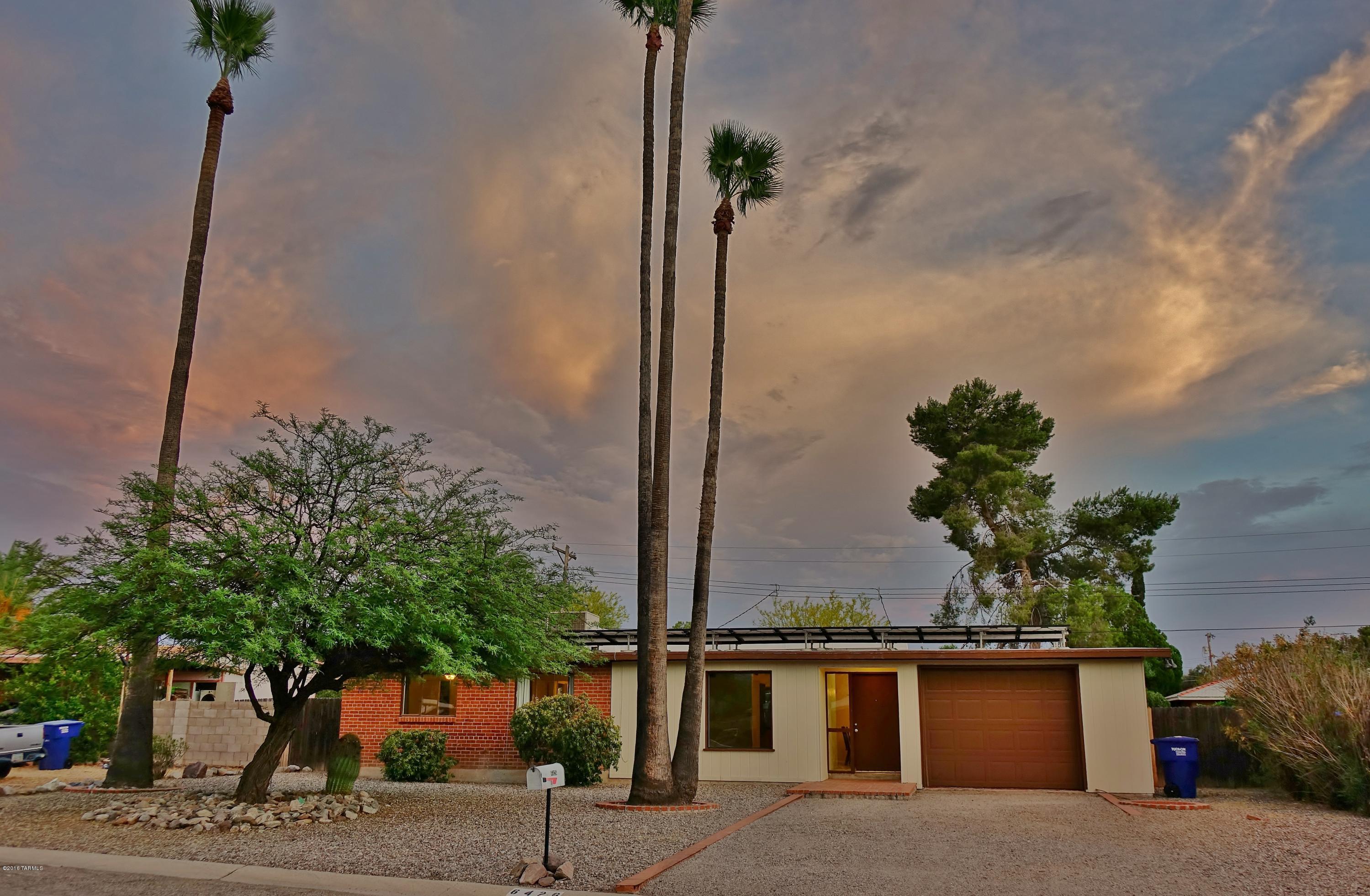 This wonderful Terra Del Sol home features an open floor plan, large windows that let in plenty of light, a remodeled kitchen with stainless steel appliances and stylish black granite counter tops. Easy-to-clean tile flooring and new paint throughout. The large backyard is great for outdoor entertaining and pets. This well-cared for home has a Solar City PV system with assumable lease that will SAVE YOU MONEY on your electric bill for years to come! Close to shopping, schools, transportation, and the Davis Monthan Air Force Base, a must see! Seller will accept or counter offers between $125,000 and $130,000.