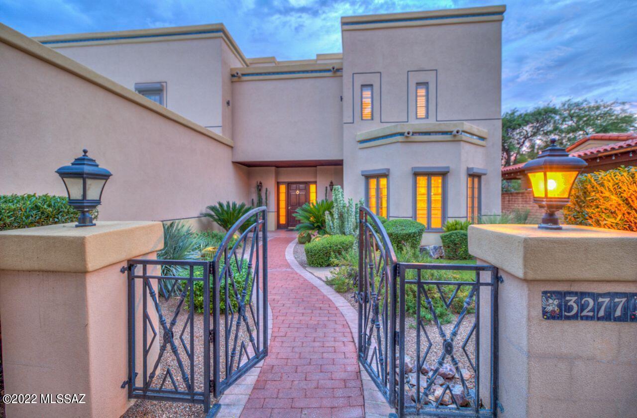 Masterful design and luxury are embodied in this 5,131 sq. ft. 5-bedroom, 5 1/2-bath, one-of-a-kind home located in the sought-after Riverbed community. Lush vegetation meaning a real FRONT LAWN welcomes you into the private courtyard and guides you inside to soaring ceilings with beautiful dramatic wood beams. Every detail carefully selected and quality custom crafted. Marble details will enchant you throughout as well as custom woodwork in the study and opulent en suite baths in every room. Gorgeous windows and doors with plantation shutters from the abundantly manicured gardens that surround the property. Other highlights include hurricane shutters to help you get a sound night sleep, a built in safe, and a stair lift to assist you up the stairs. Welcome home!